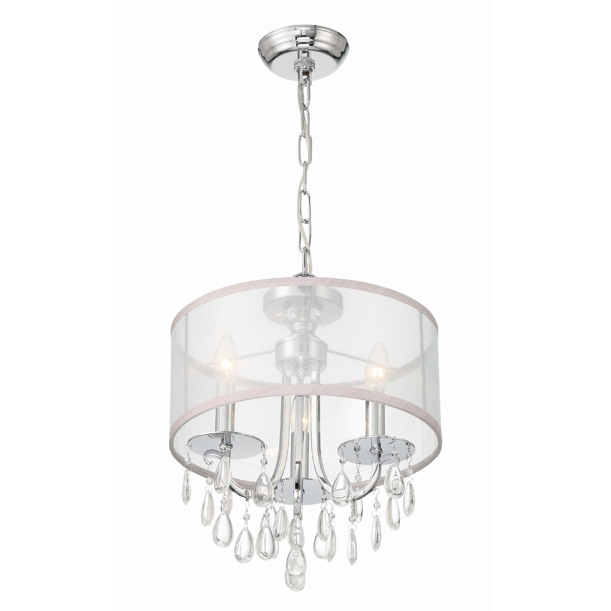 Shown in Polished Chrome finish and Clear Teardrop Almond crystal and Silk glass and Translucent Silver shade