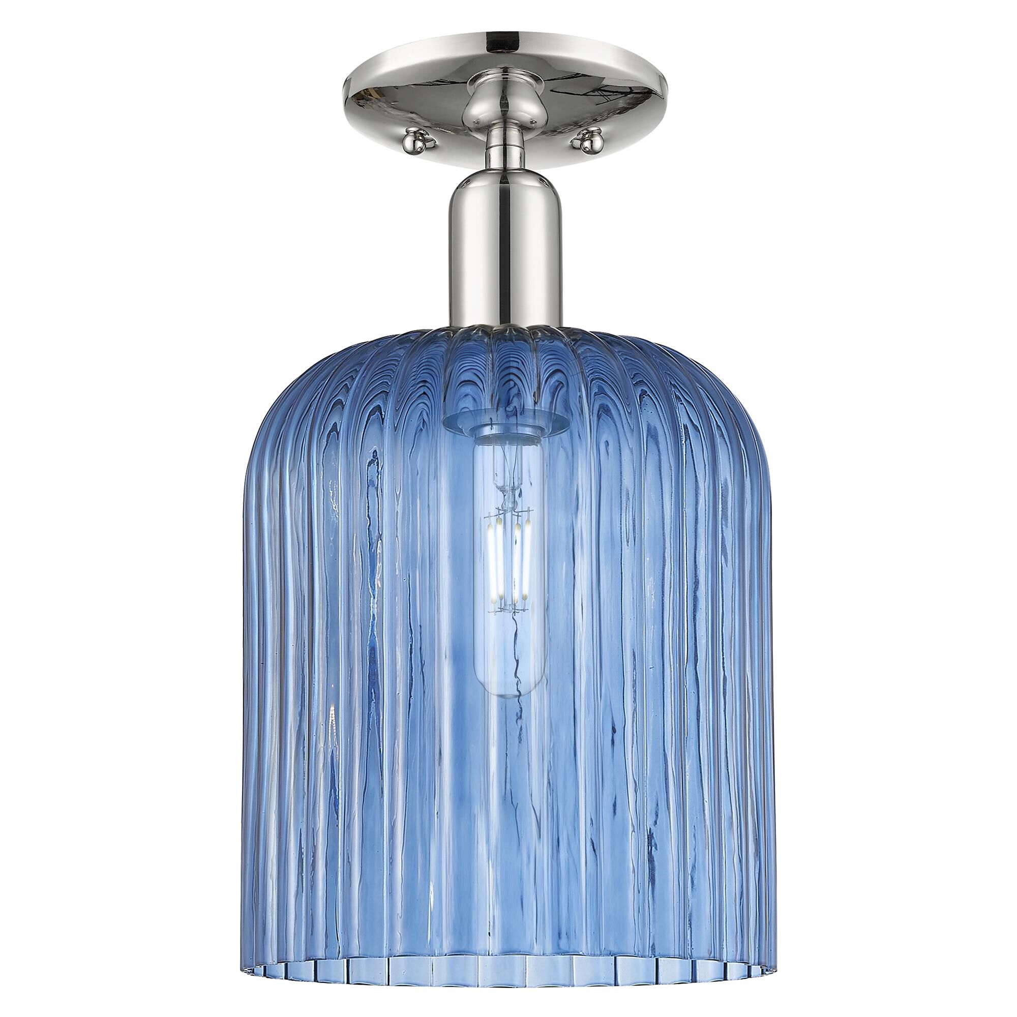 Shown in Polished Nickel finish and Blue glass