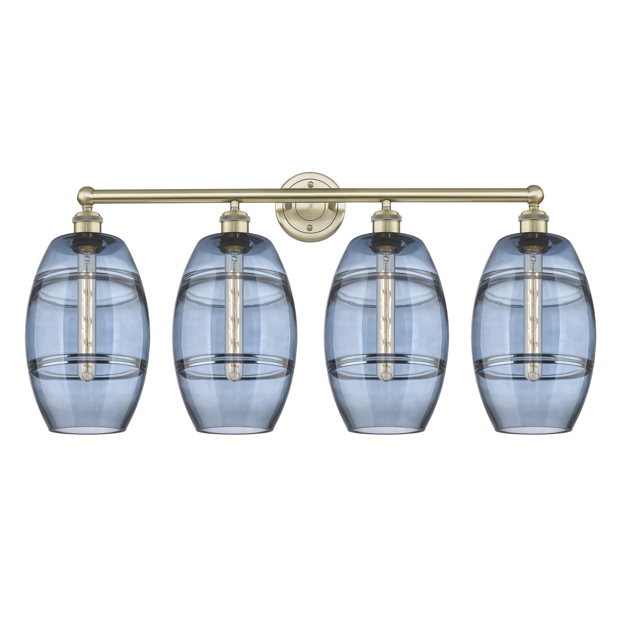 Shown in Antique Brass finish and Princess Blue glass