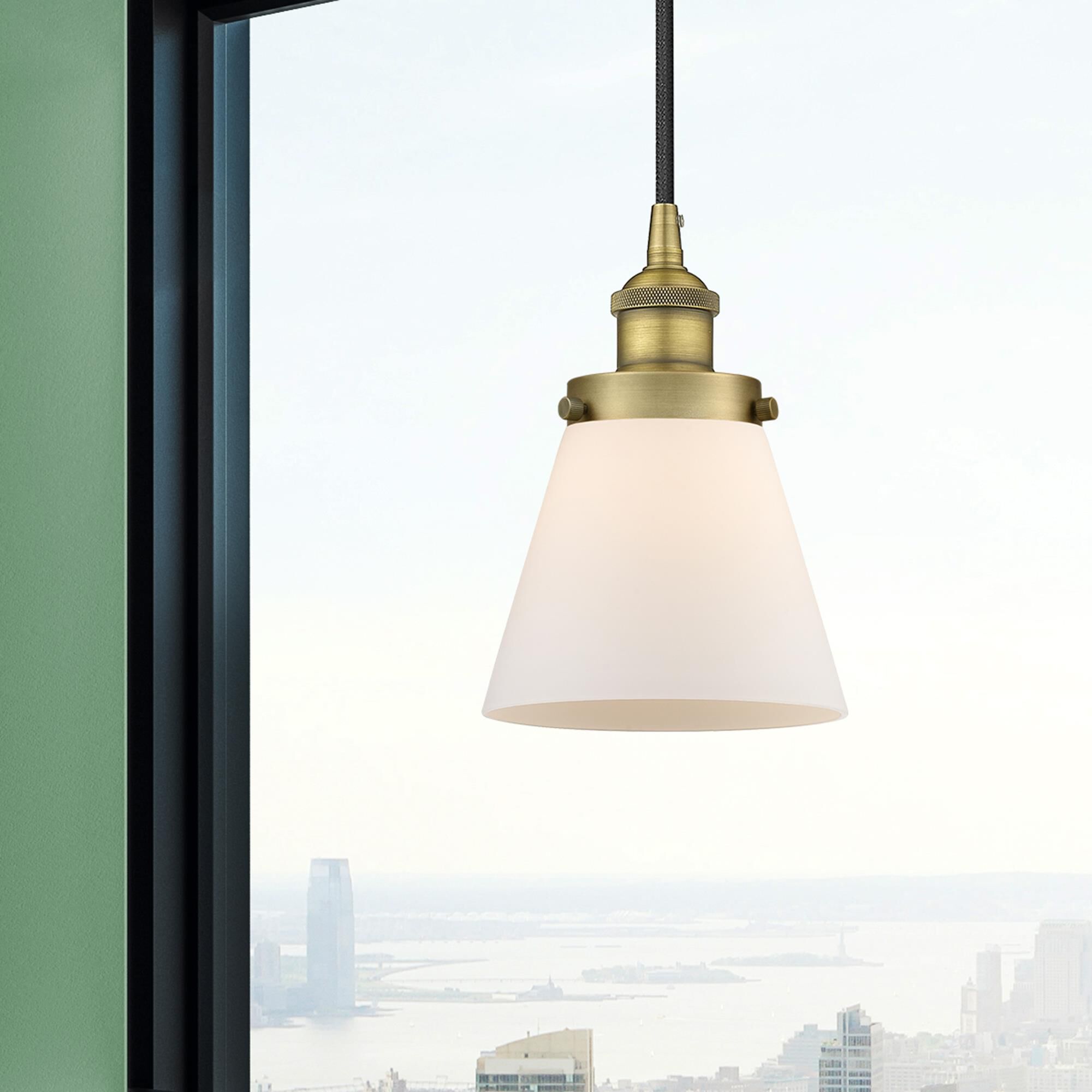 Shown in Brushed Brass finish and Matte White Cased Small Cone glass