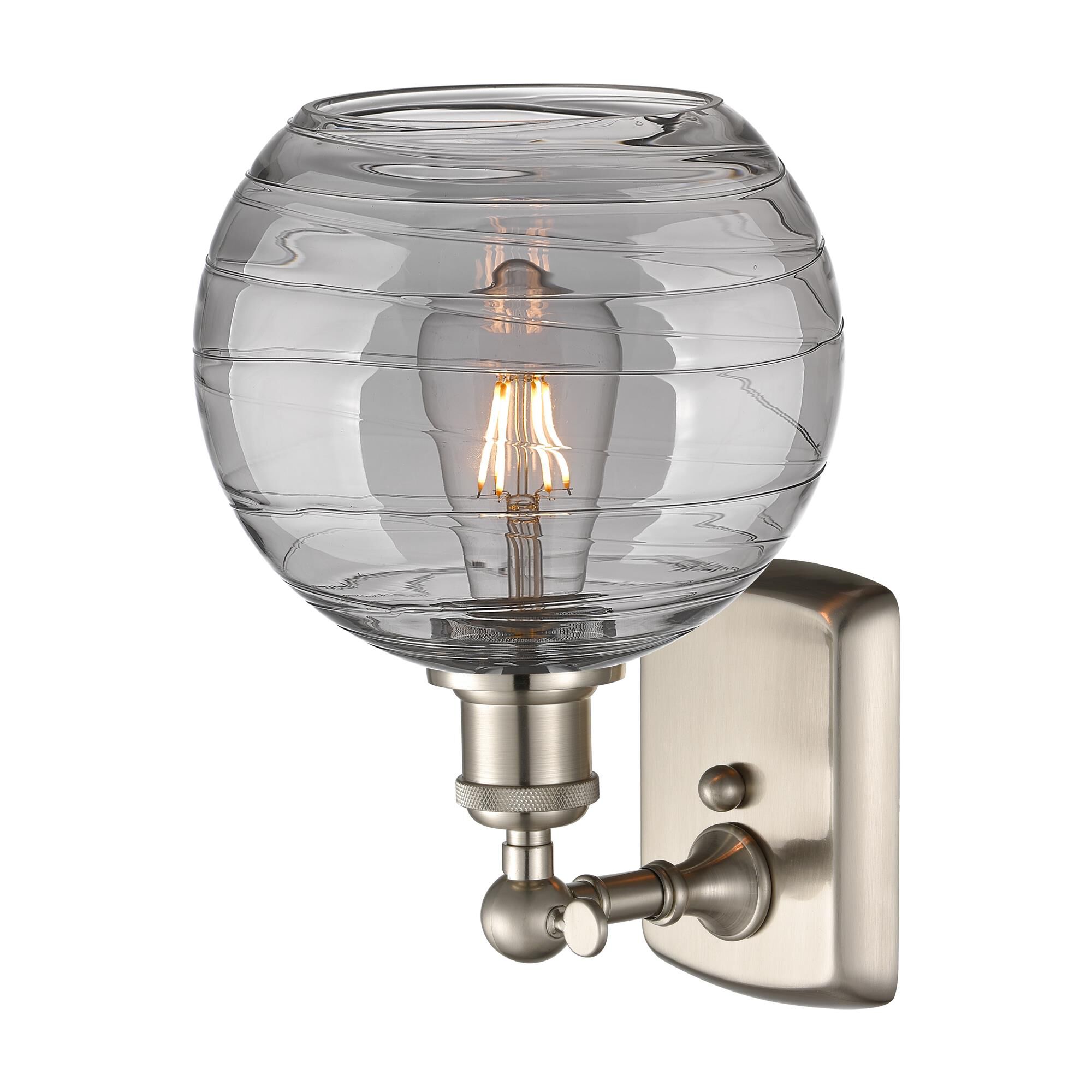 Shown in Brushed Satin Nickel finish and Light Smoke Deco Swirl glass