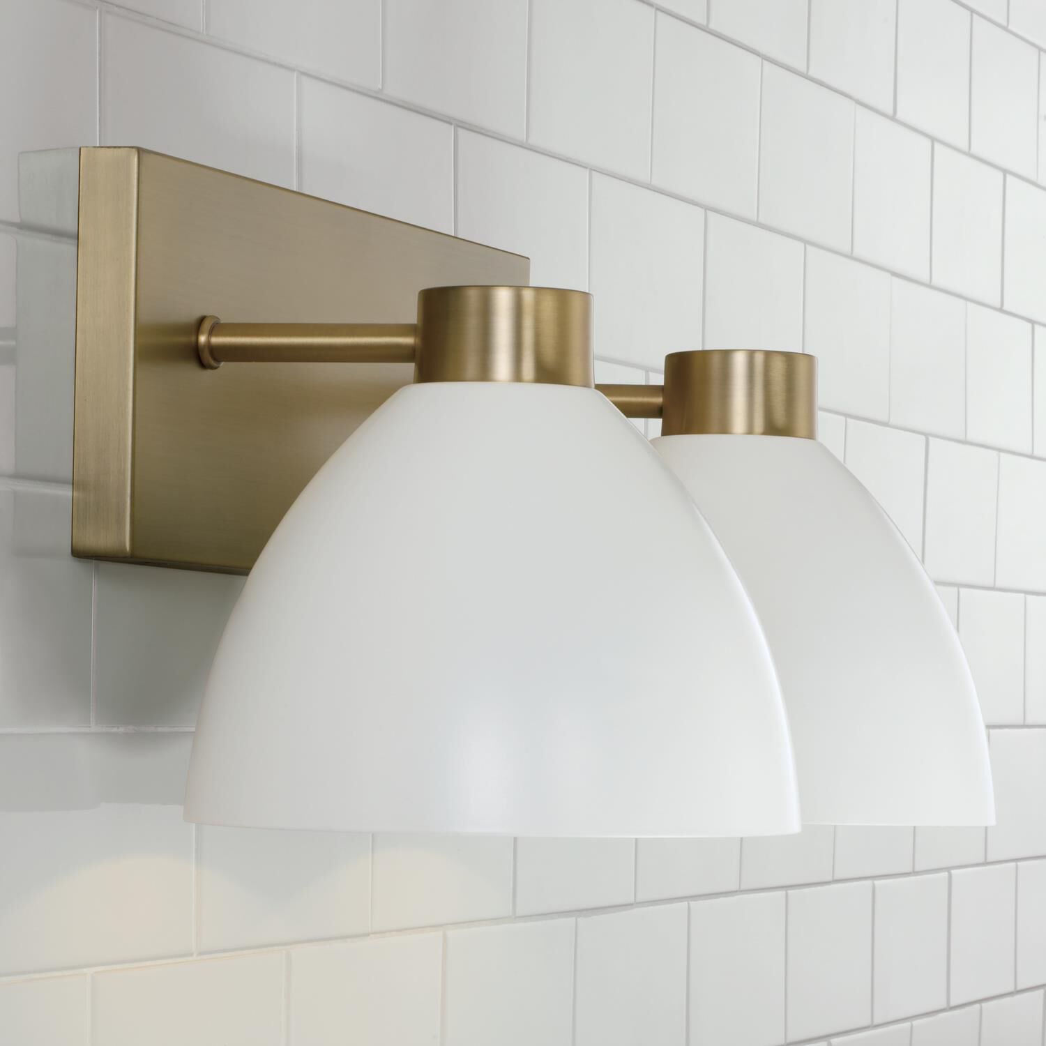 Shown in Aged Brass And White finish and Matte White Metal shade
