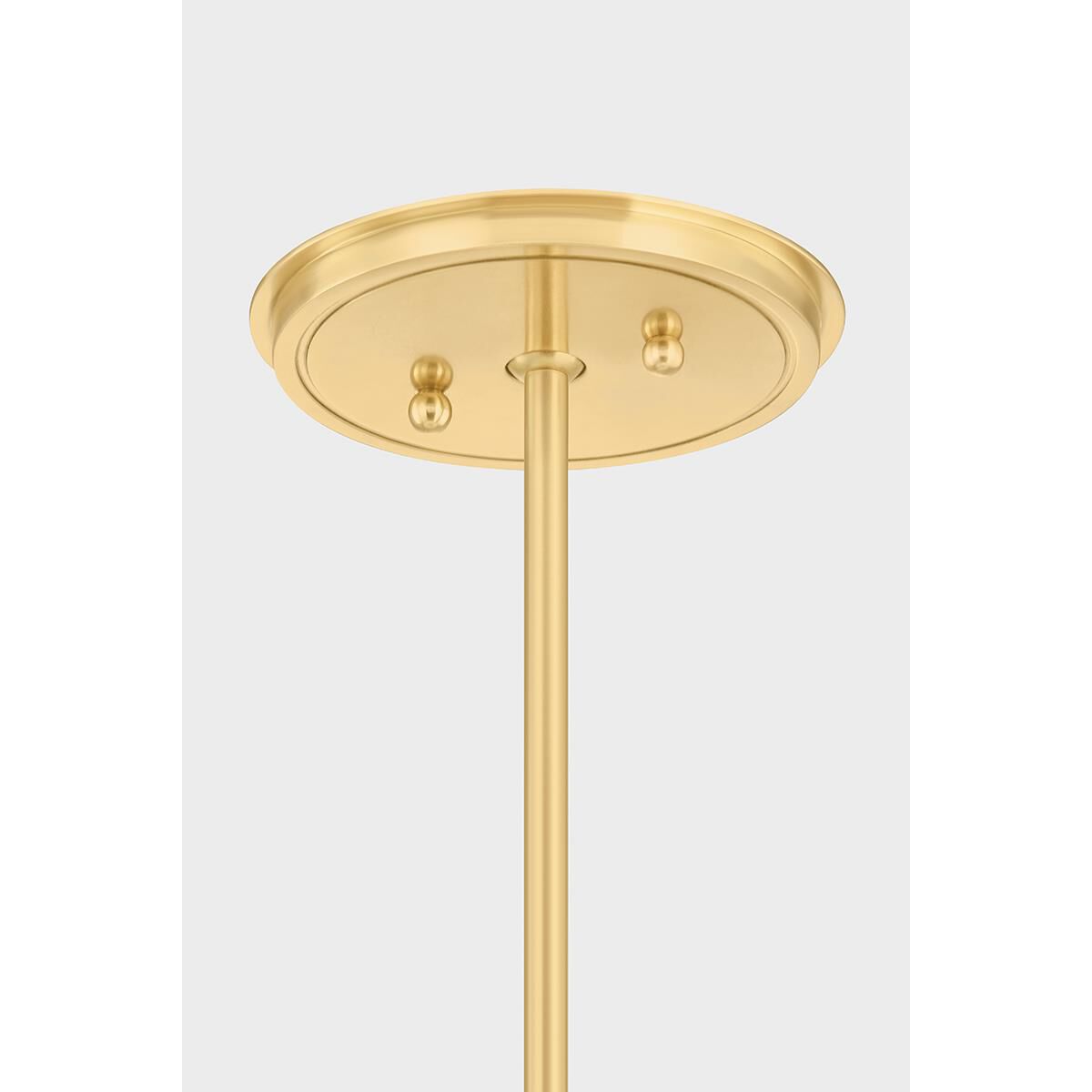 Shown in Aged Brass finish and Ivory Linen shade