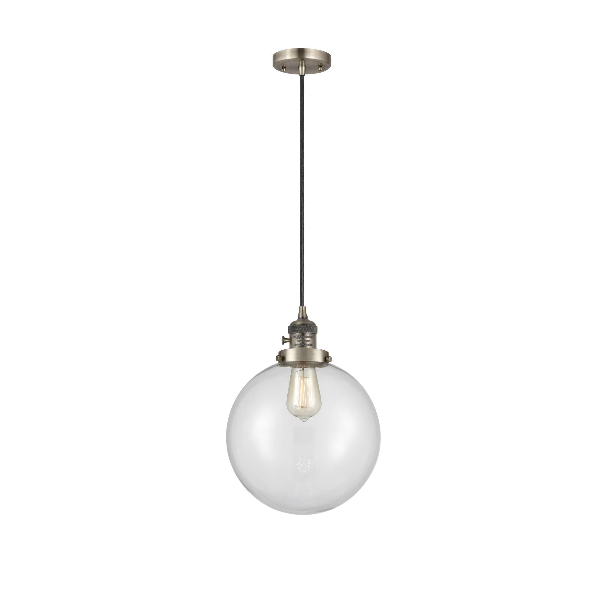 Shown in Antique Brass finish and Clear glass