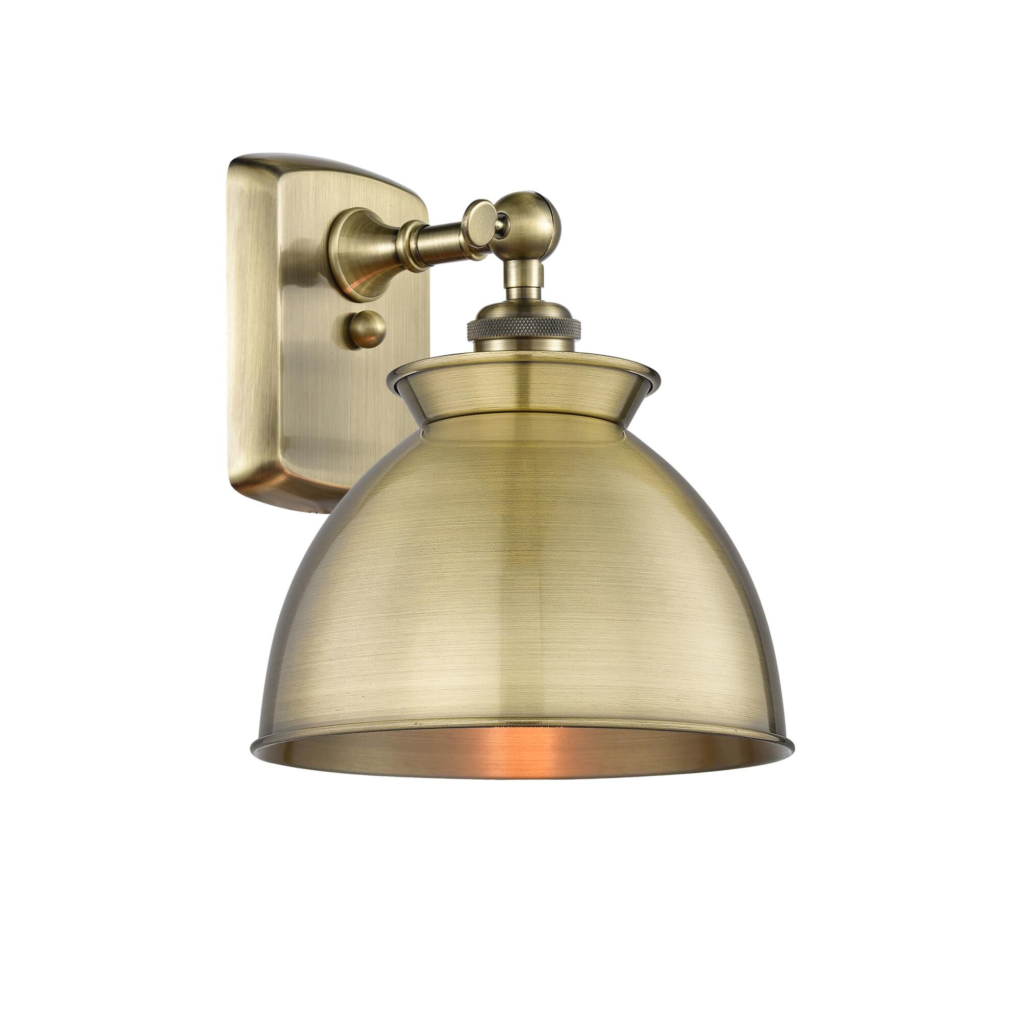Shown in Antique Brass finish and Antique Brass shade