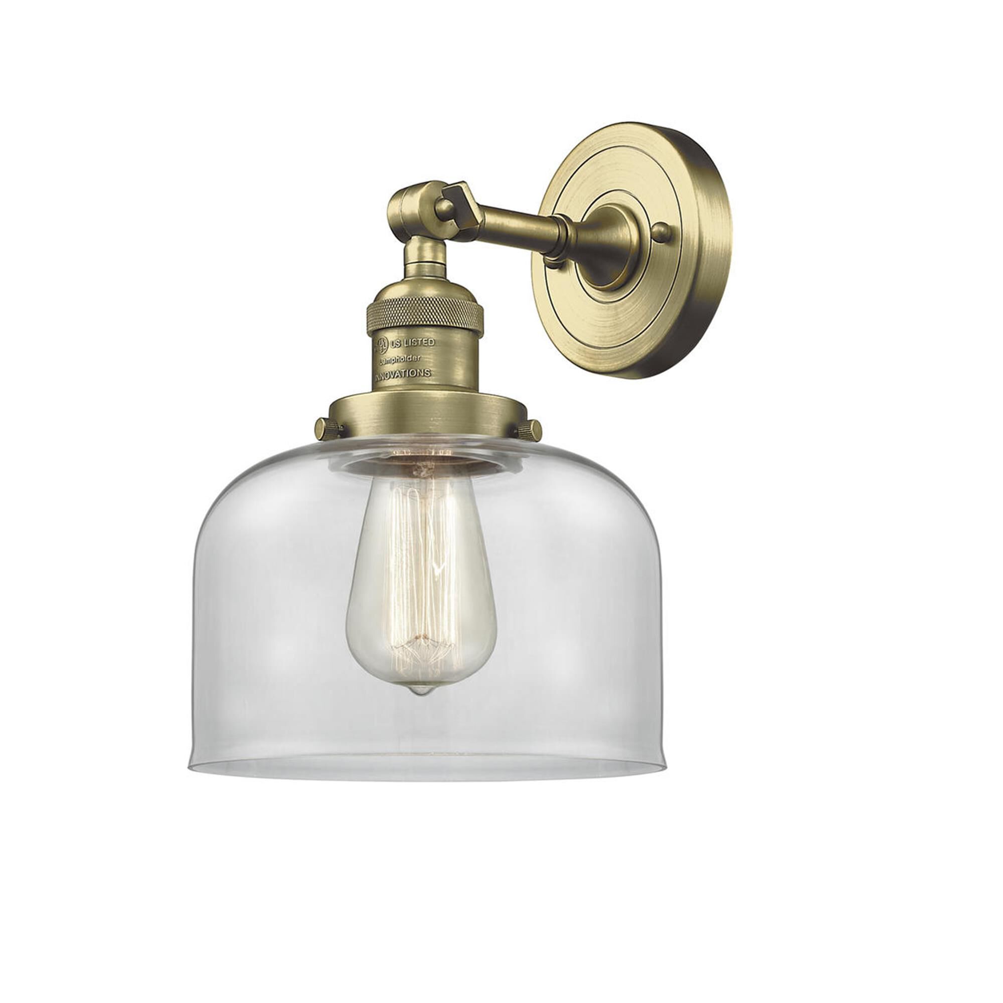 Shown in Antique Brass finish and Clear glass