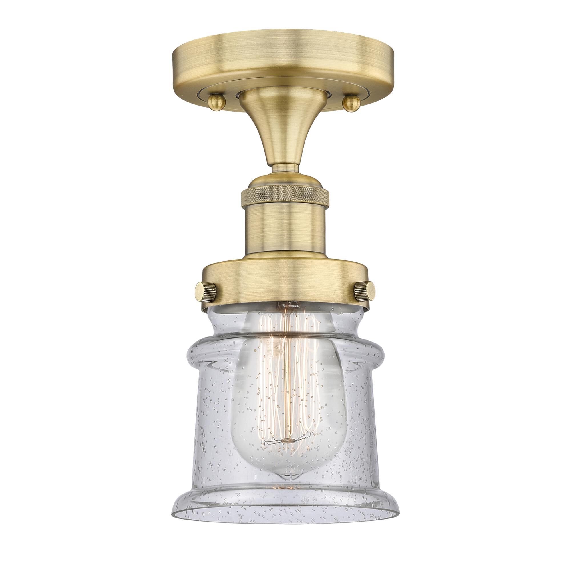 Shown in Brushed Brass finish and Seedy glass