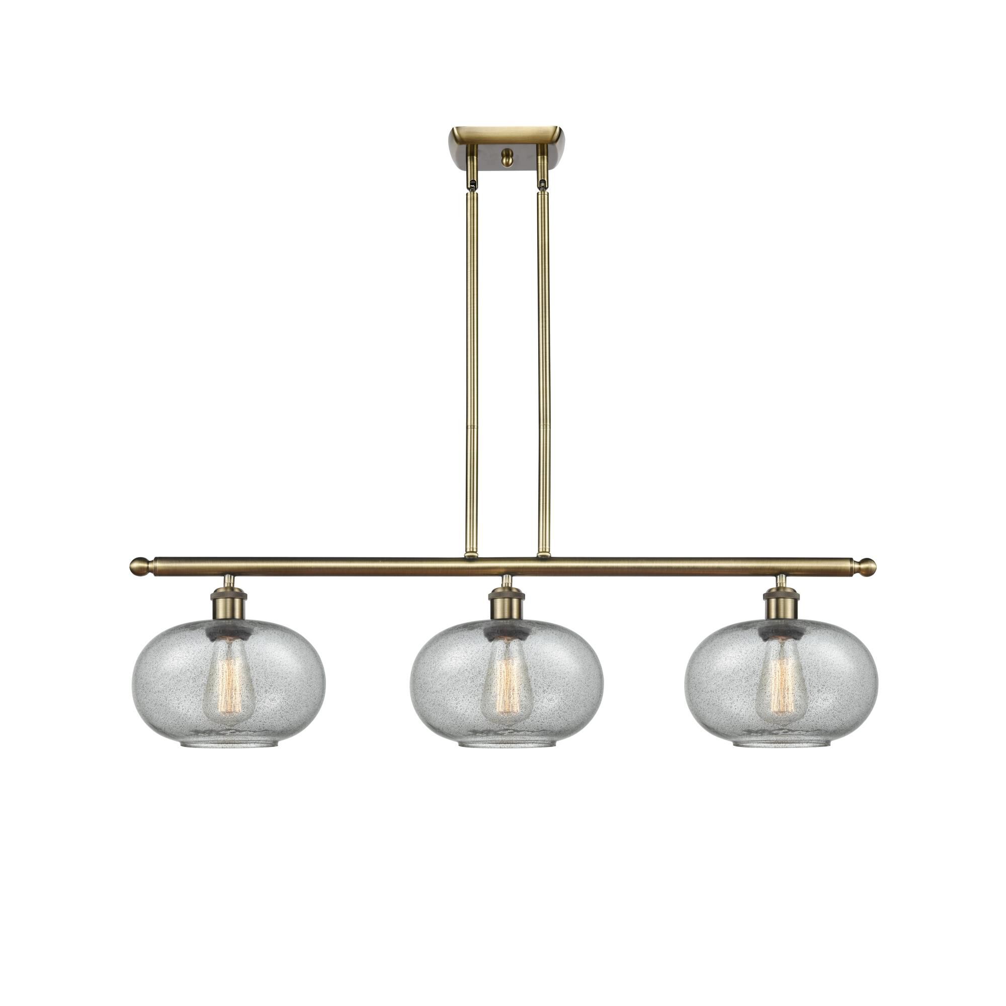 Shown in Antique Brass finish and Sphere glass and Glass shade