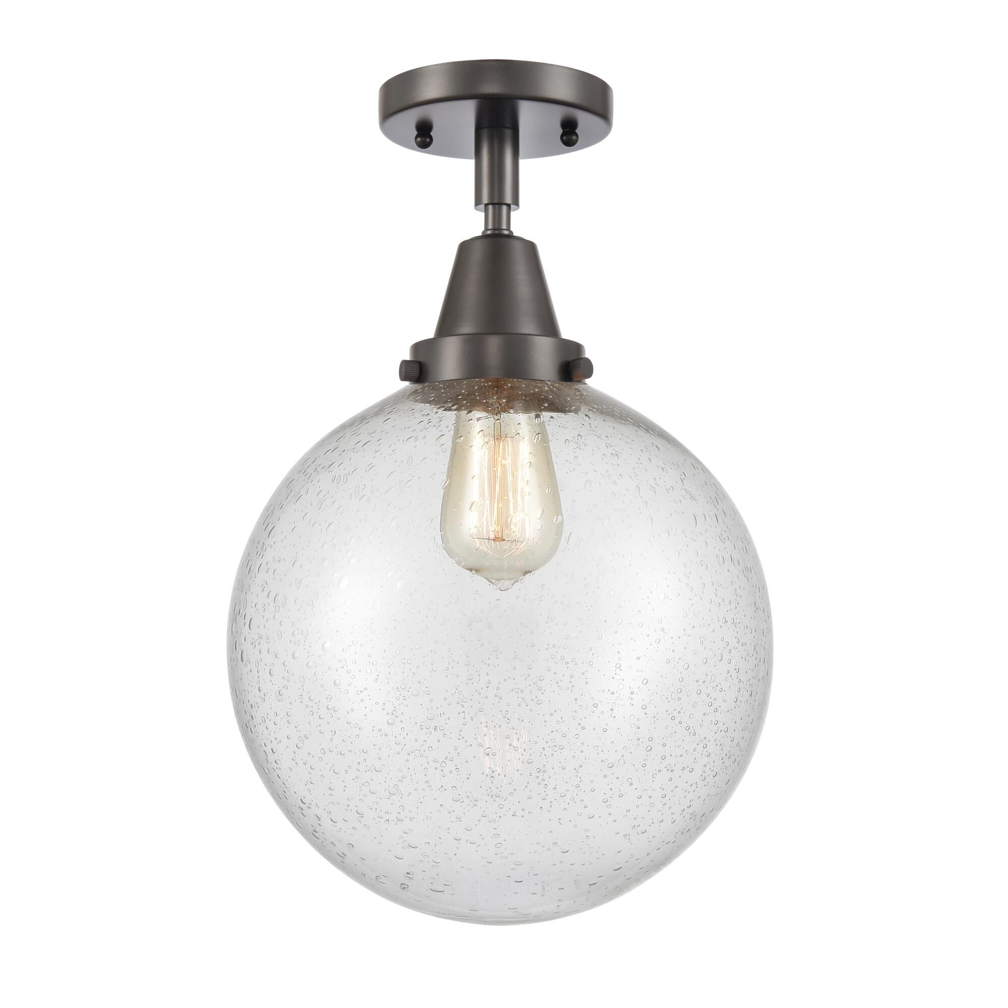 Shown in Oil Rubbed Bronze finish and Seedy Beacon glass