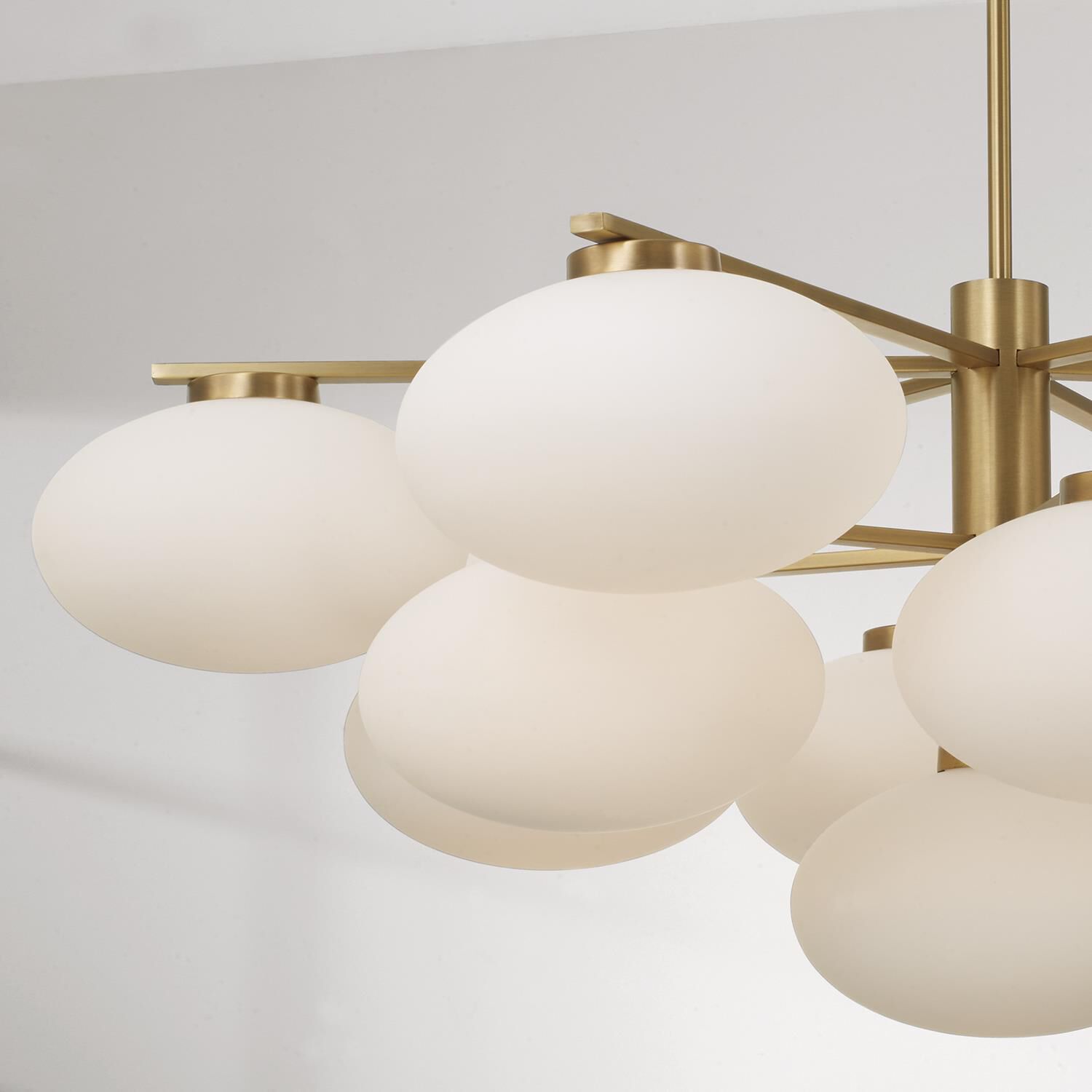 Shown in Aged Brass finish and Soft White glass