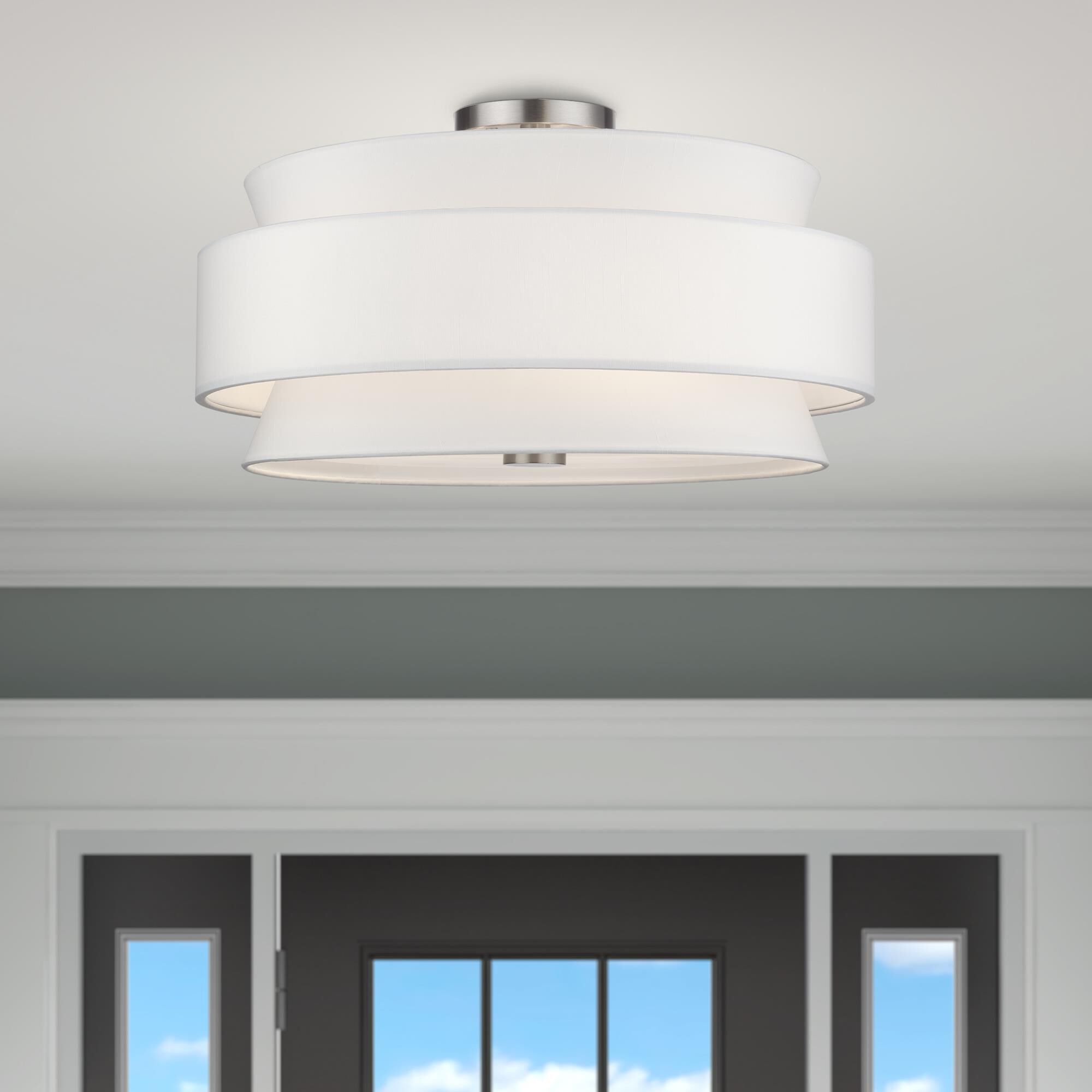 Shown in Brushed Nickel finish and Hand Crafted Off-White Fabric Hardbacks with White Fabric Inside shade