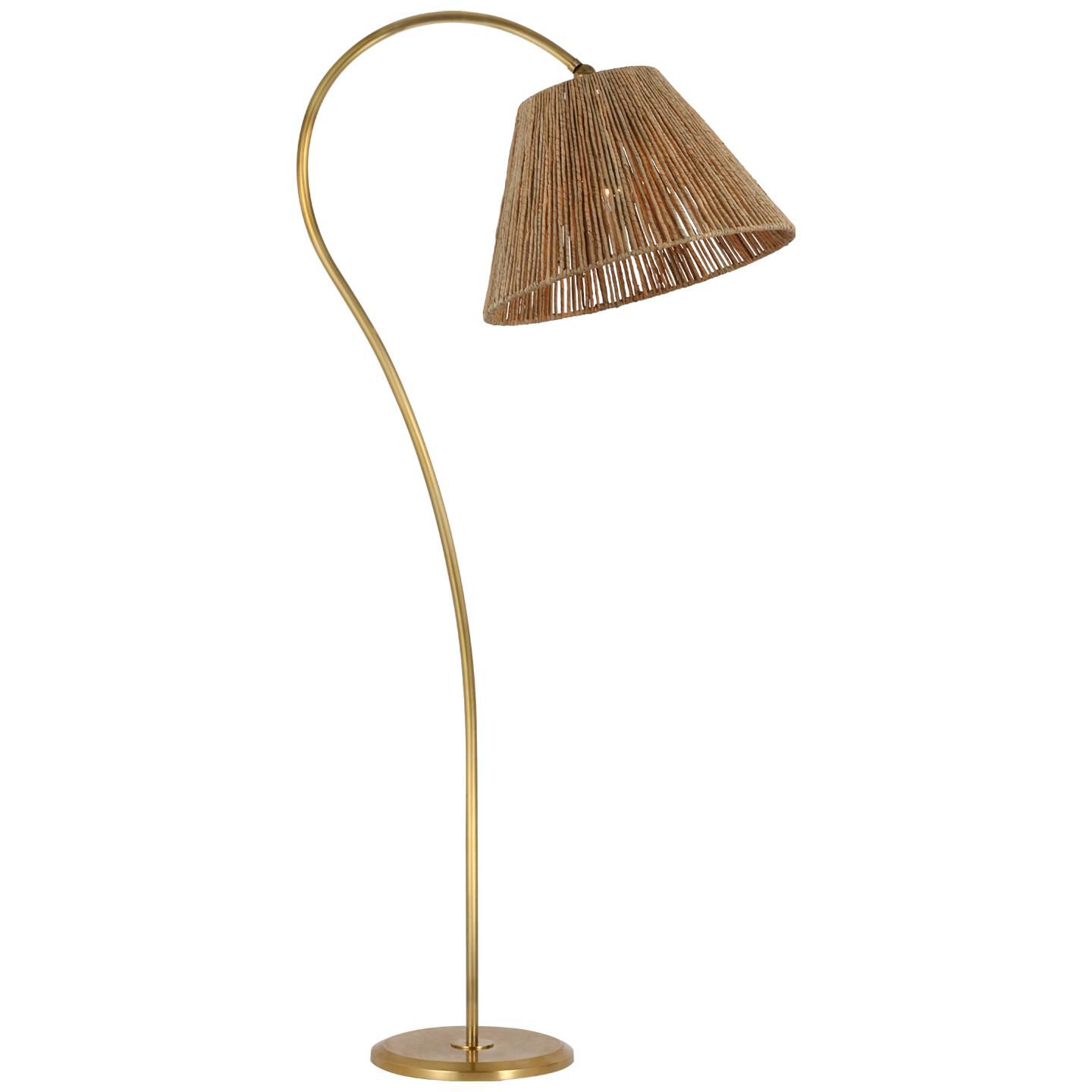 Shown in Hand-Rubbed Antique Brass finish and Natural Abaca shade