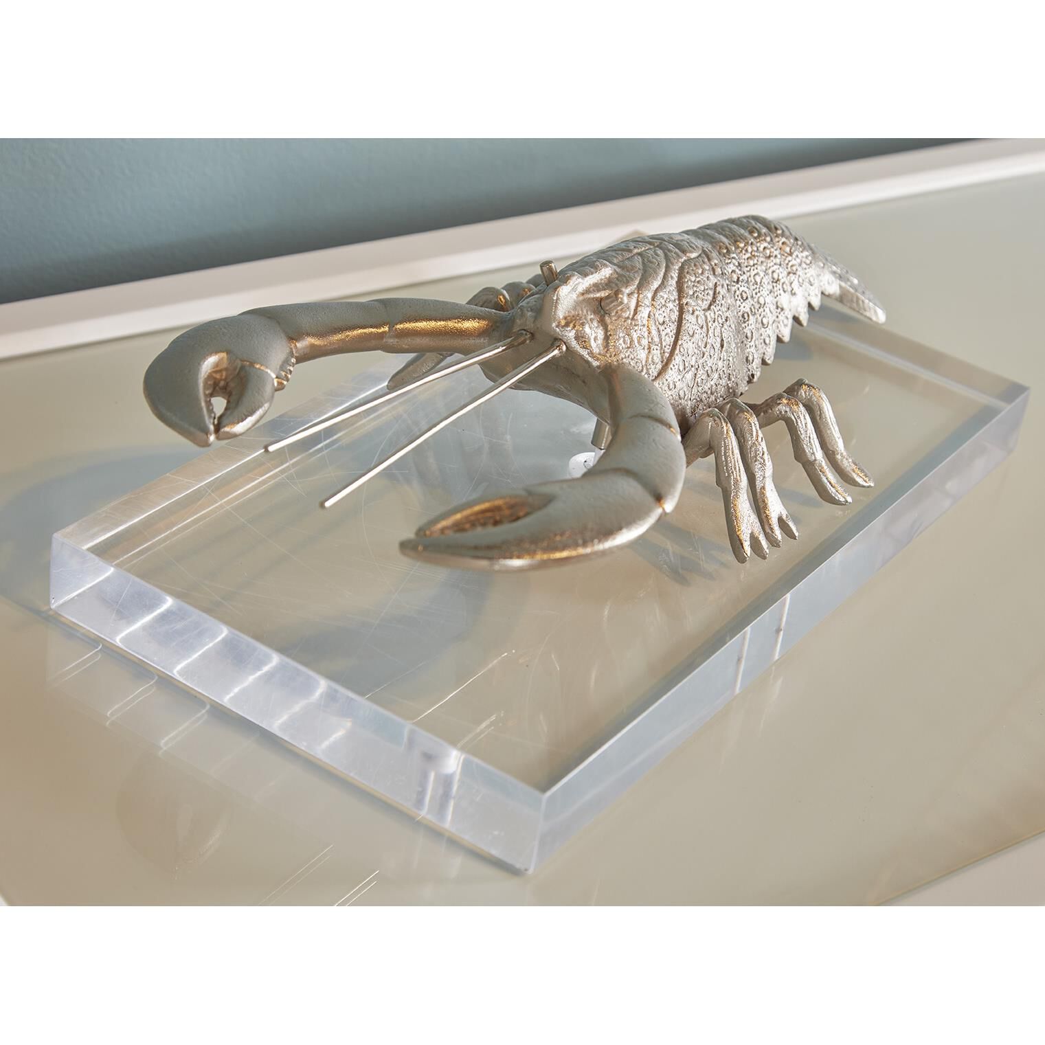 Shown in Brushed Nickel and Clear finish