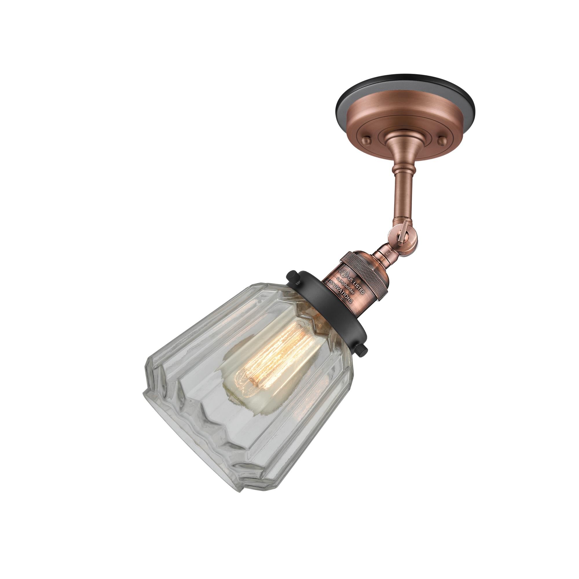 Shown in Antique Copper finish and Clear Chatham glass and Matte Black accent