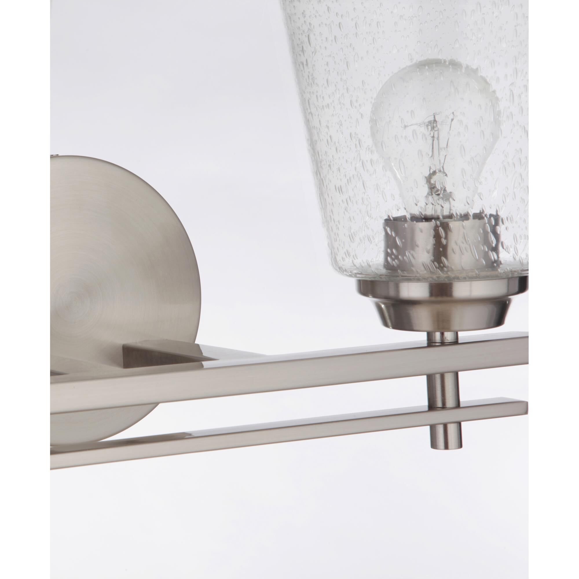 Shown in Brushed Polished Nickel finish and Clear Seeded glass and Glass shade