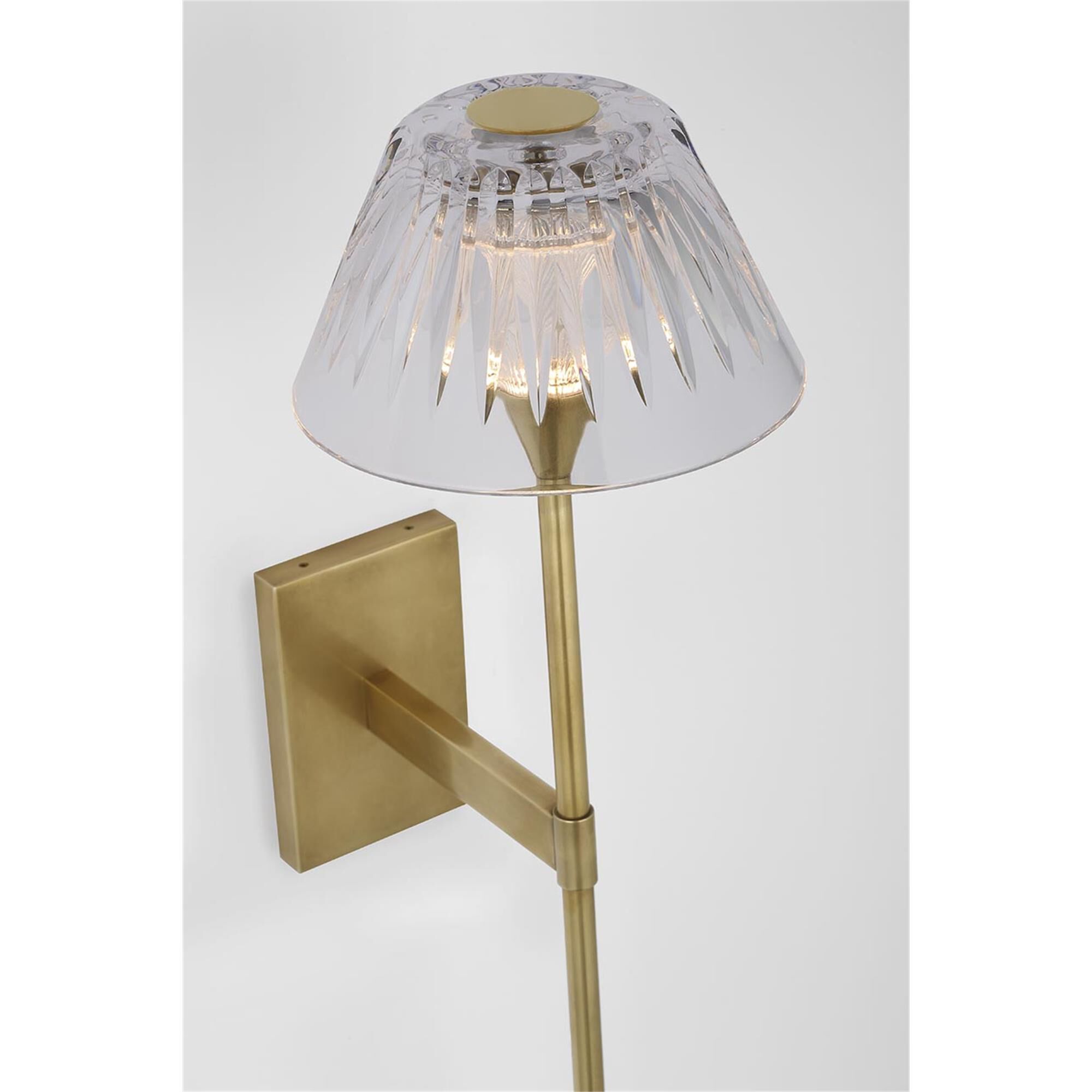 Shown in Natural Brass finish and Clear crystal
