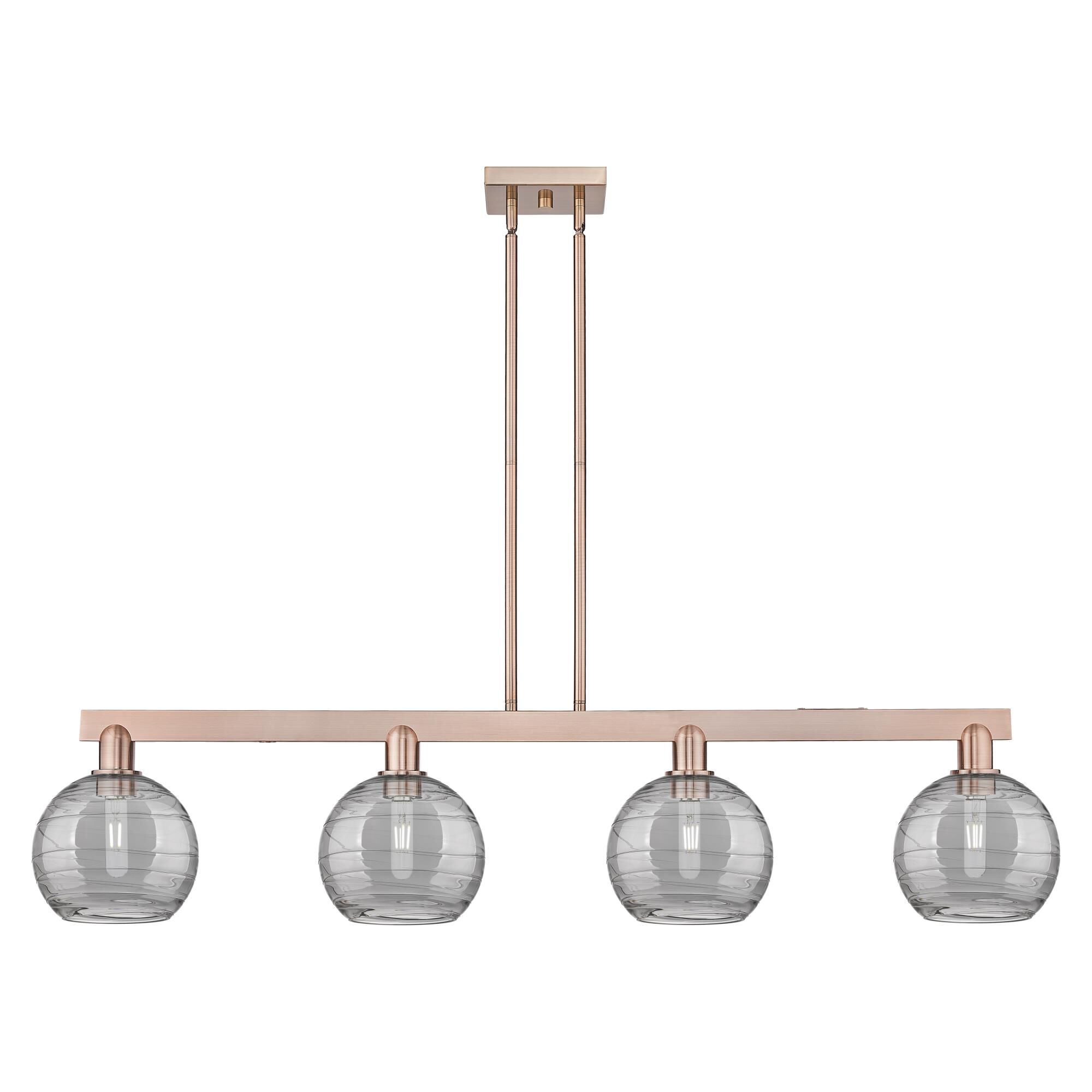 Shown in Antique Copper finish and Light Smoke Deco Swirl glass