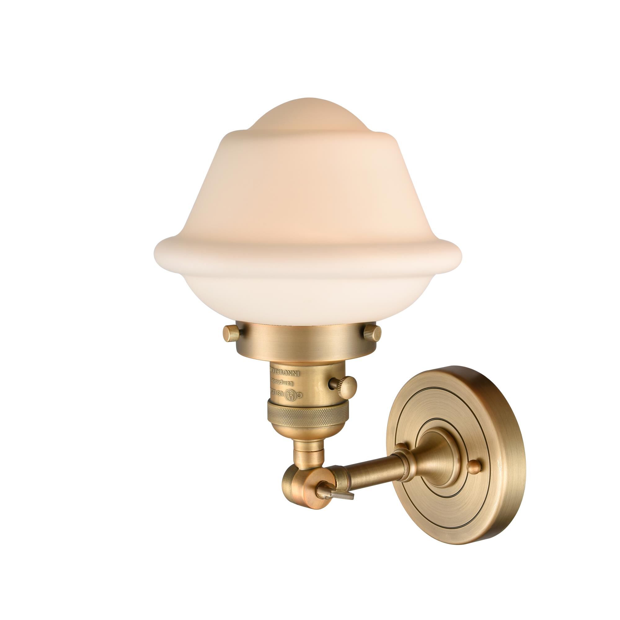 Shown in Brushed Brass finish and Matte White Cased glass and Switch on Socket accent
