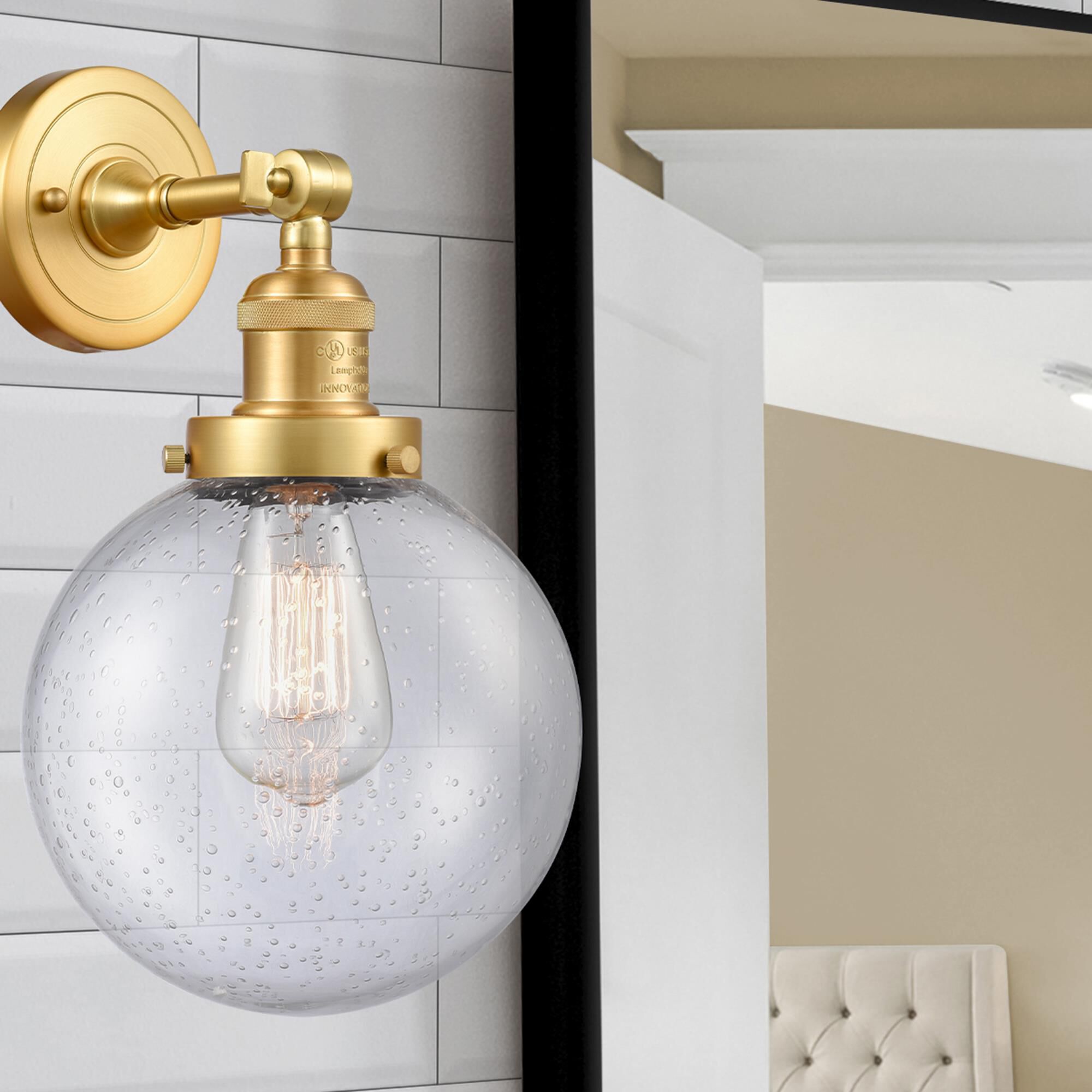 Shown in Satin Gold finish and Seedy Beacon glass