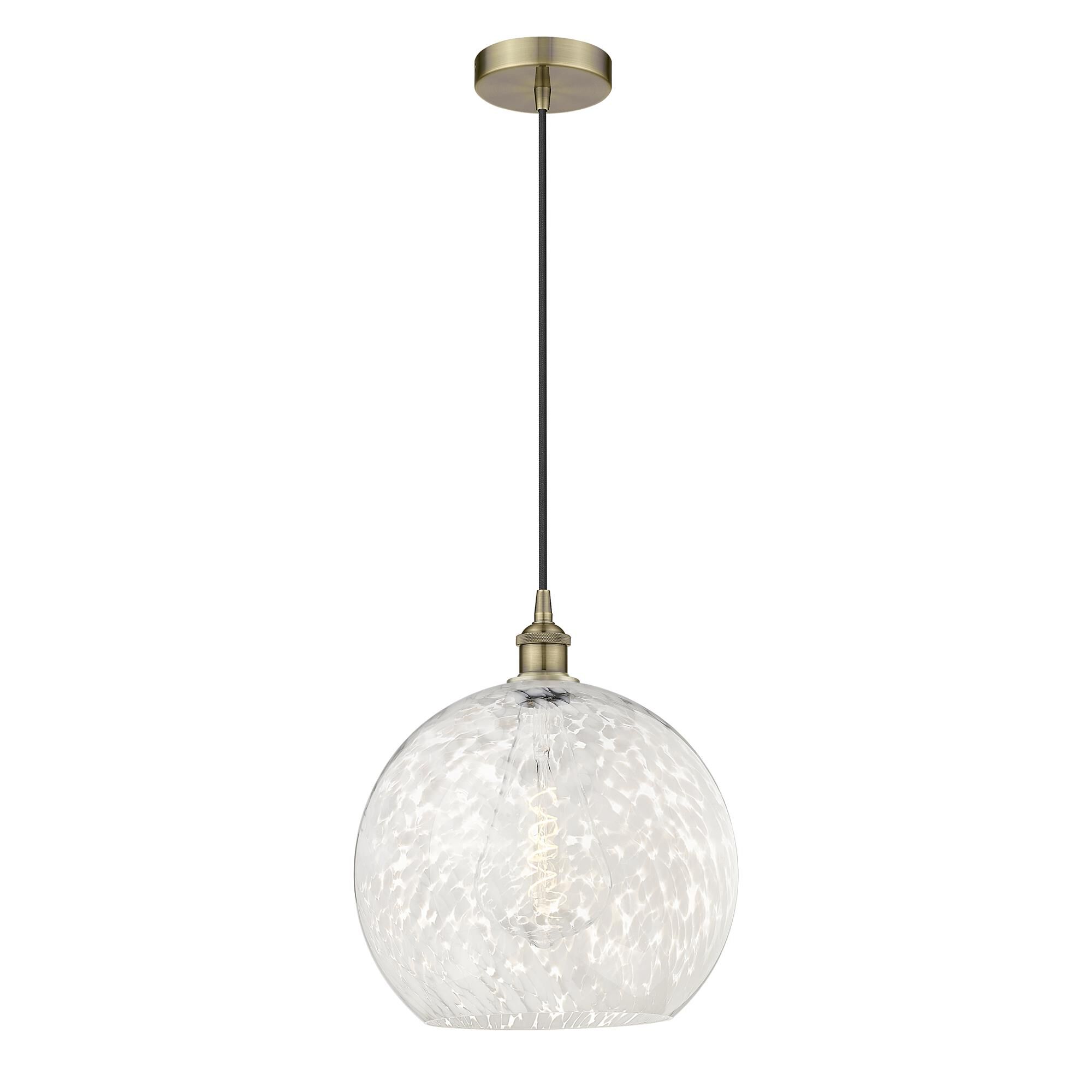 Shown in Antique Brass finish and White Mouchette glass