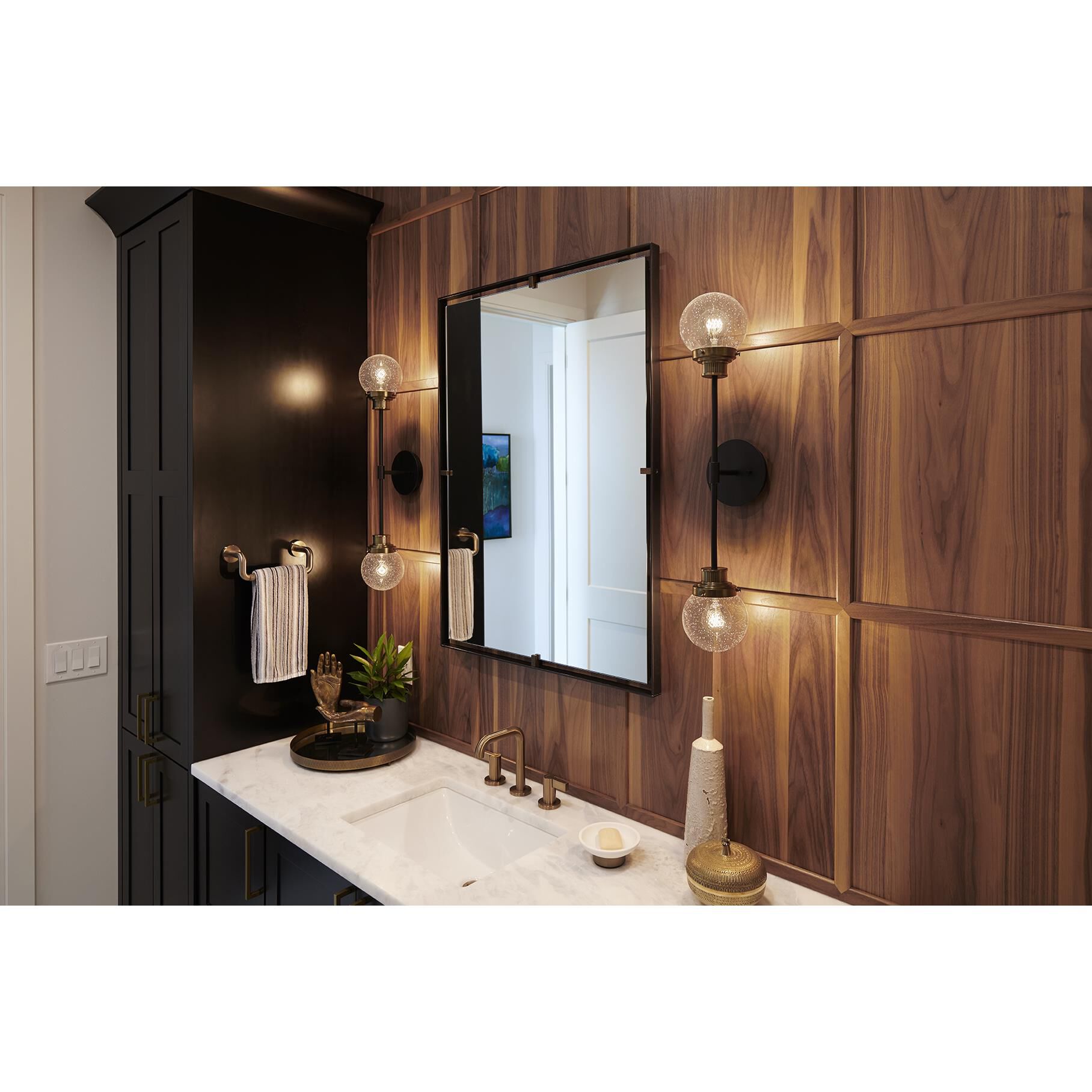 Shown in Black finish and Clear Seedy glass and Heritage Brass accent