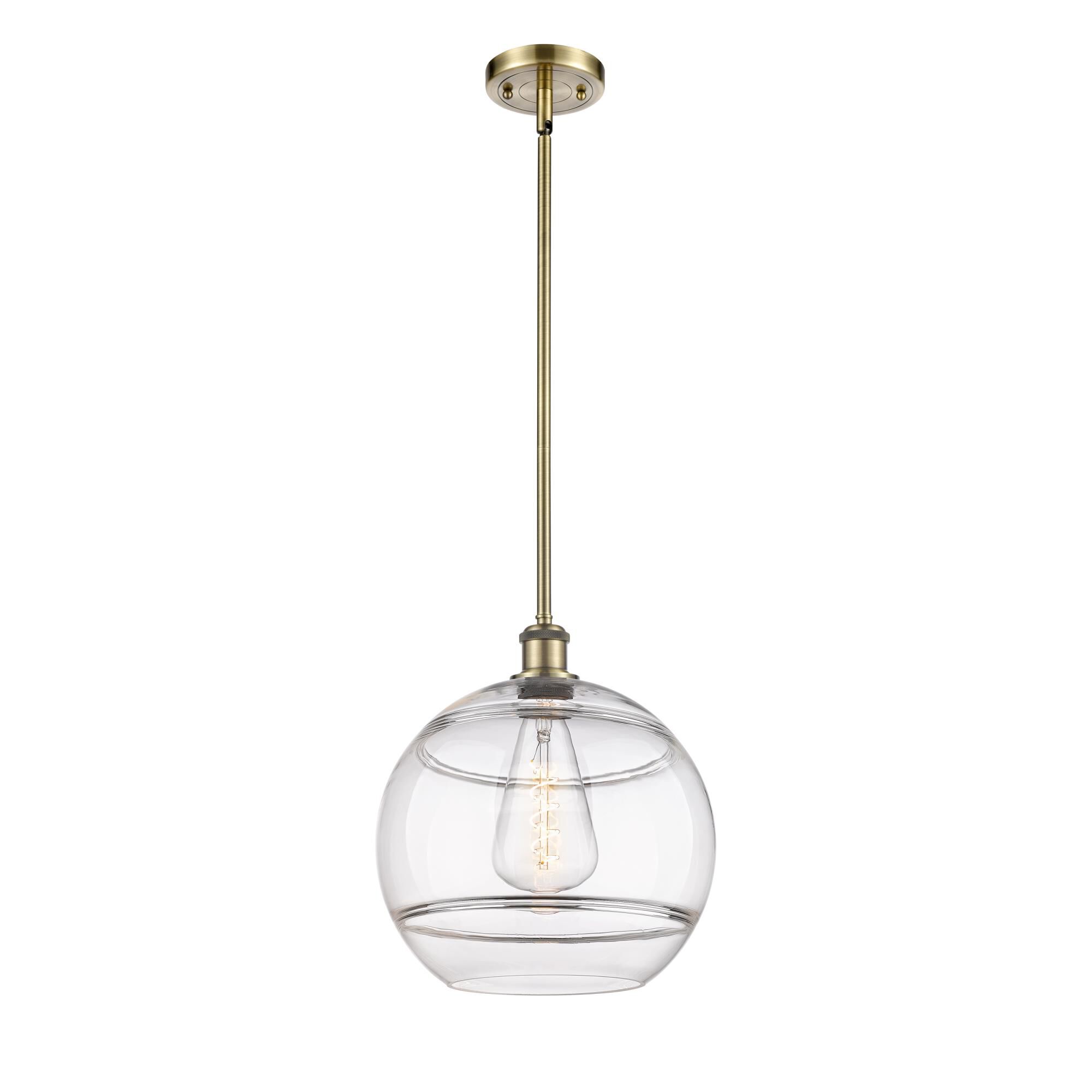 Shown in Antique Brass finish and Clear glass