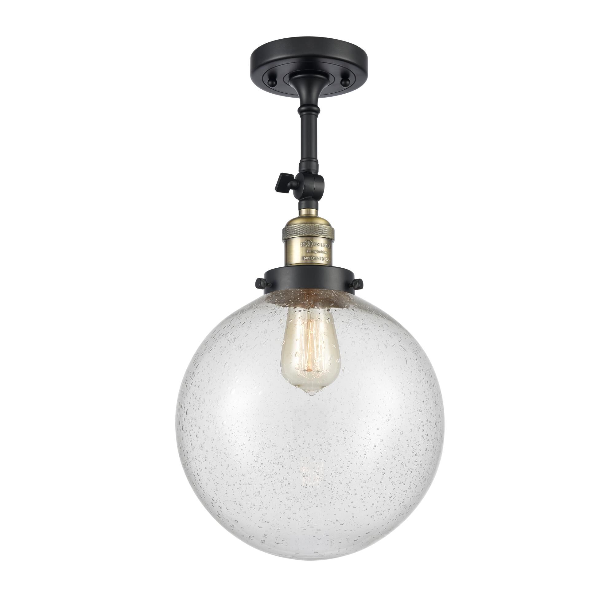 Shown in Black Antique Brass finish and Seedy glass