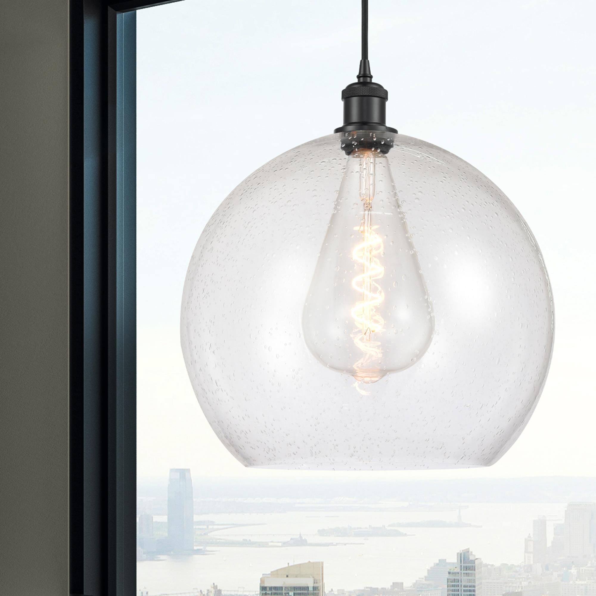 Shown in Matte Black finish and Seedy glass