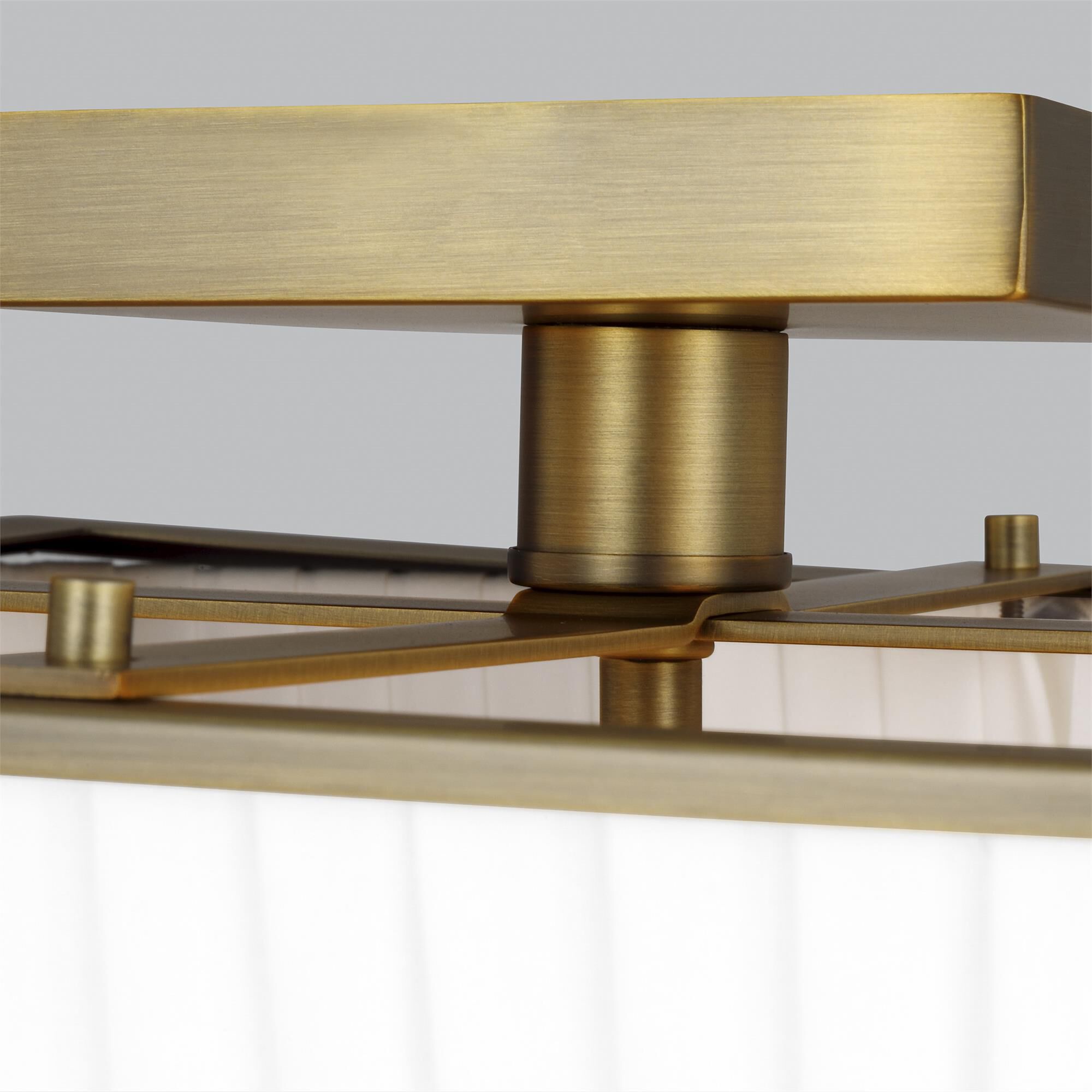 Shown in Time Worn Brass finish and Milk White glass