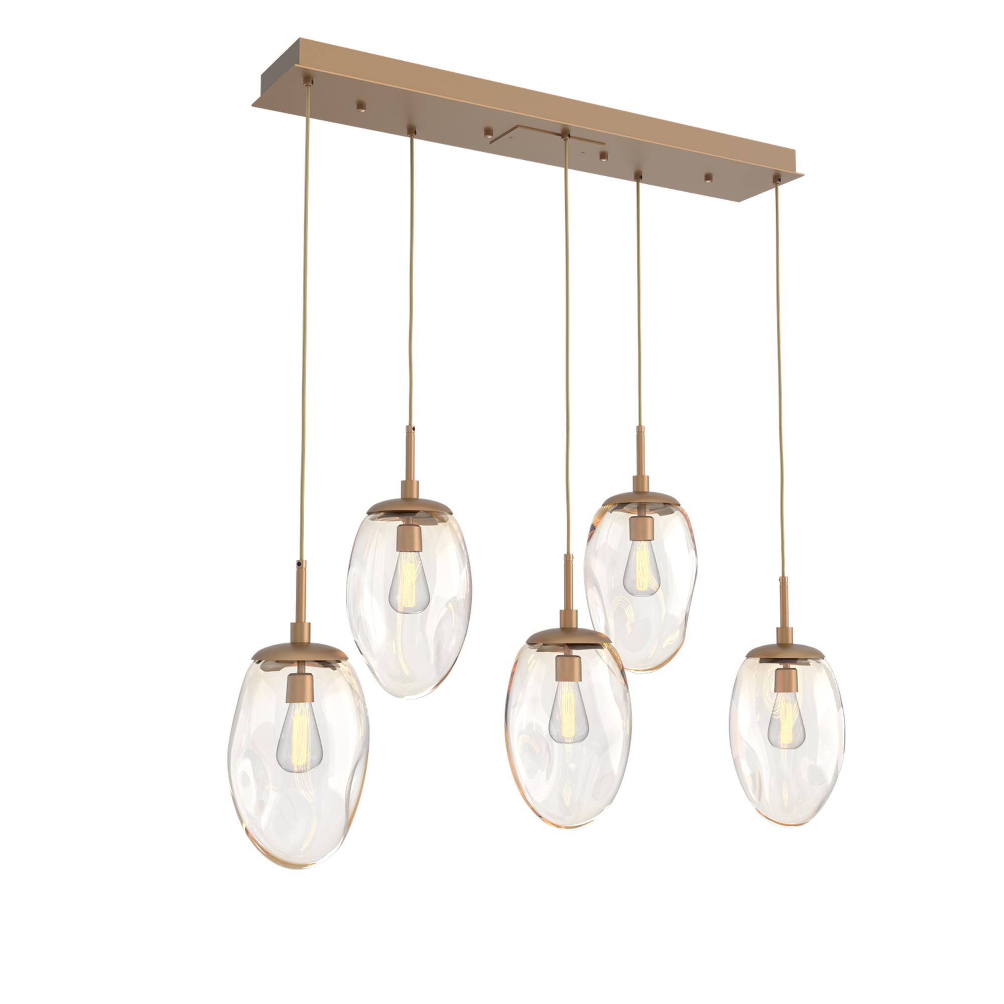 Shown in Novel Brass finish and Amber Blown glass