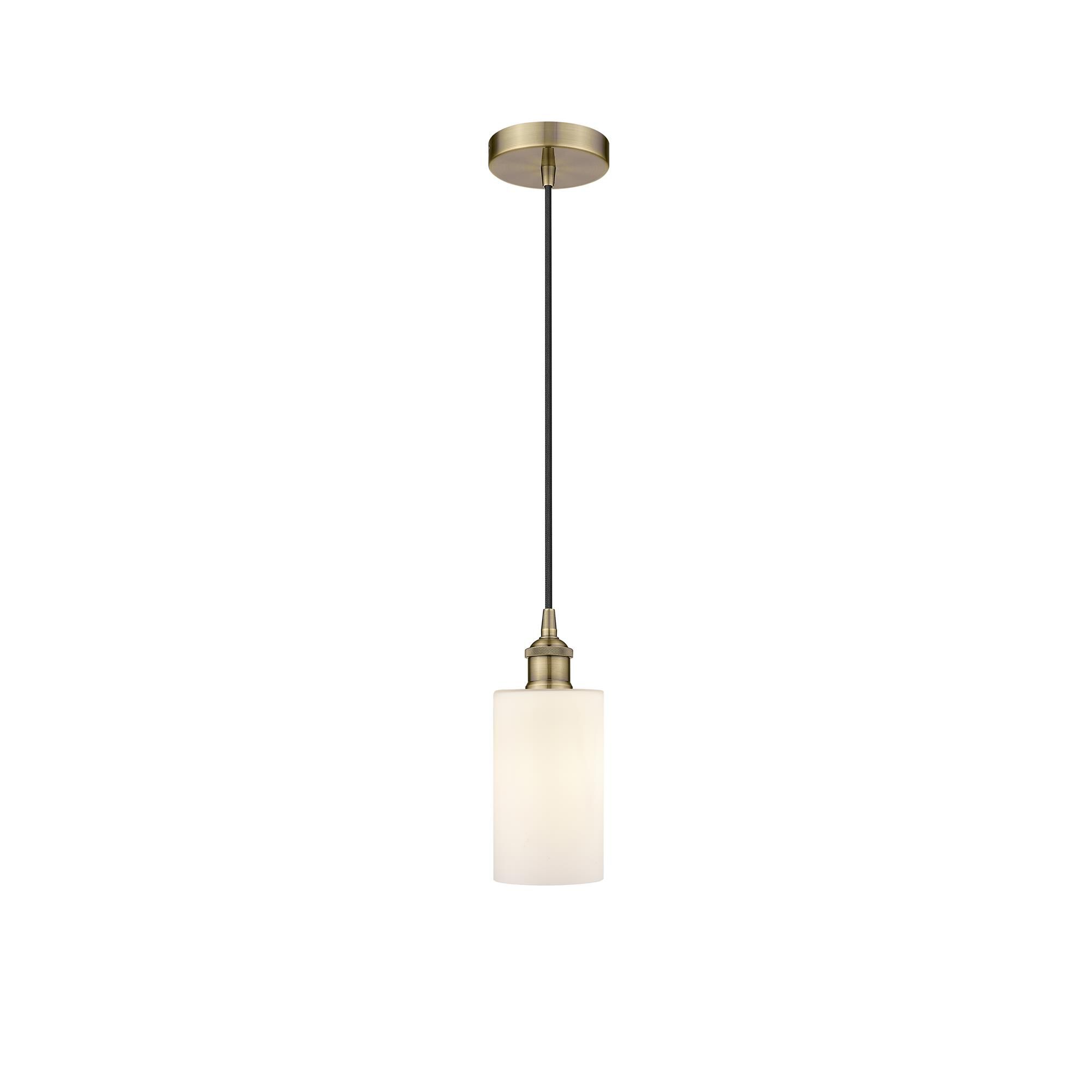 Shown in Antique Brass finish and Matte White Clymer glass