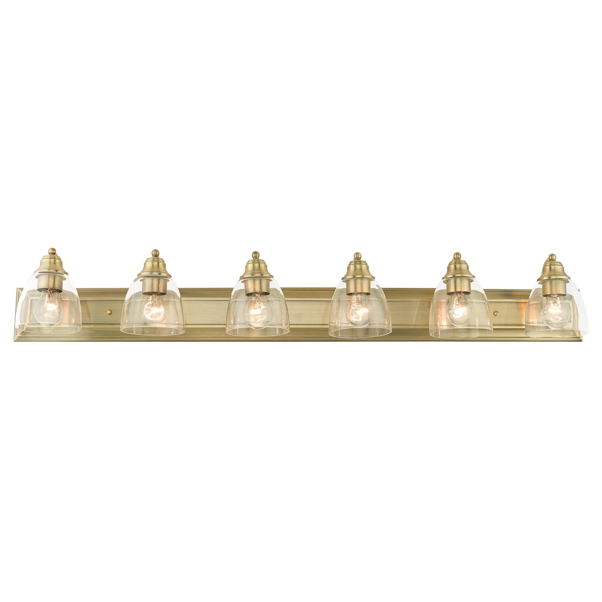 Shown in Antique Brass finish and Hand Blown Clear glass