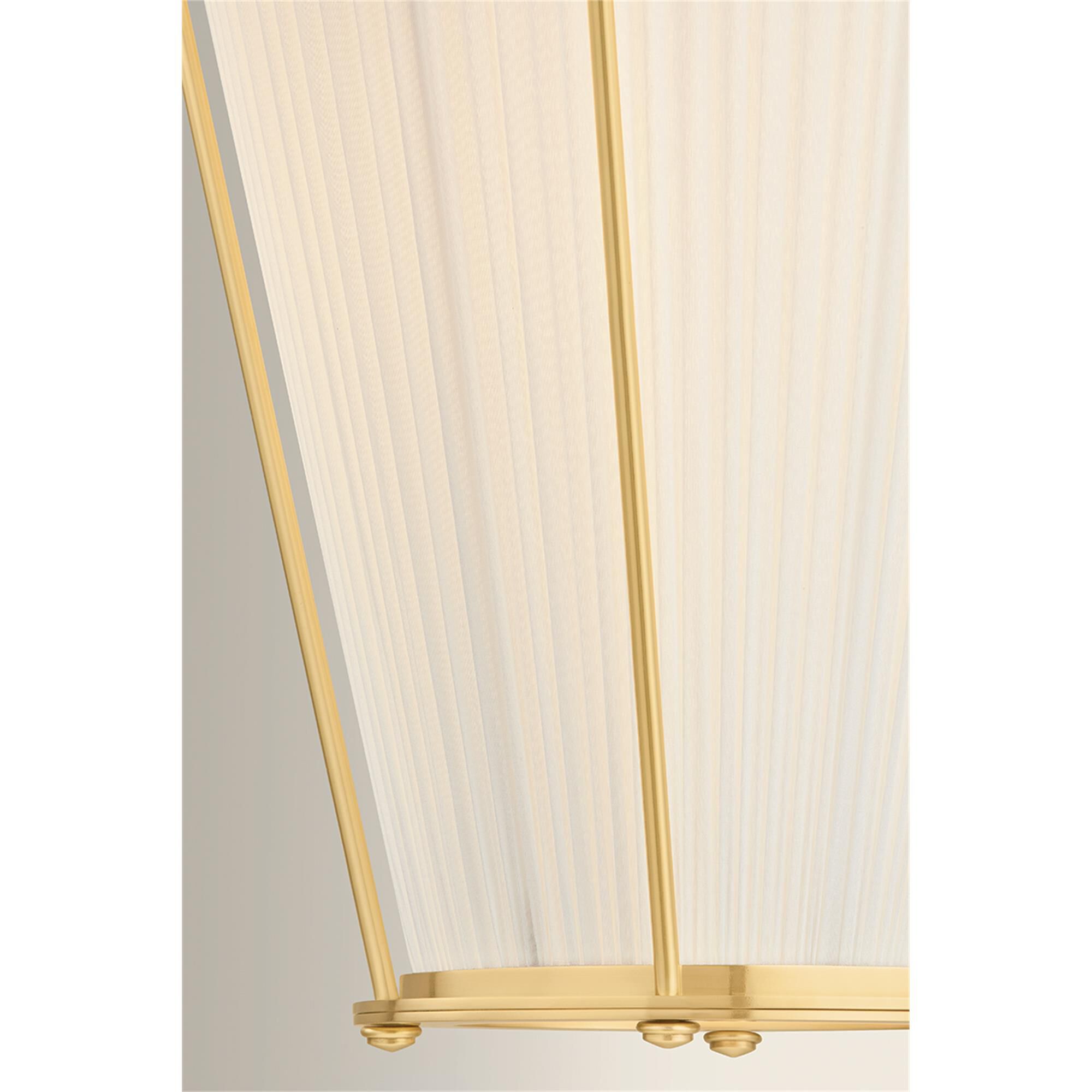 Shown in Aged Brass finish and Ivory Silk shade