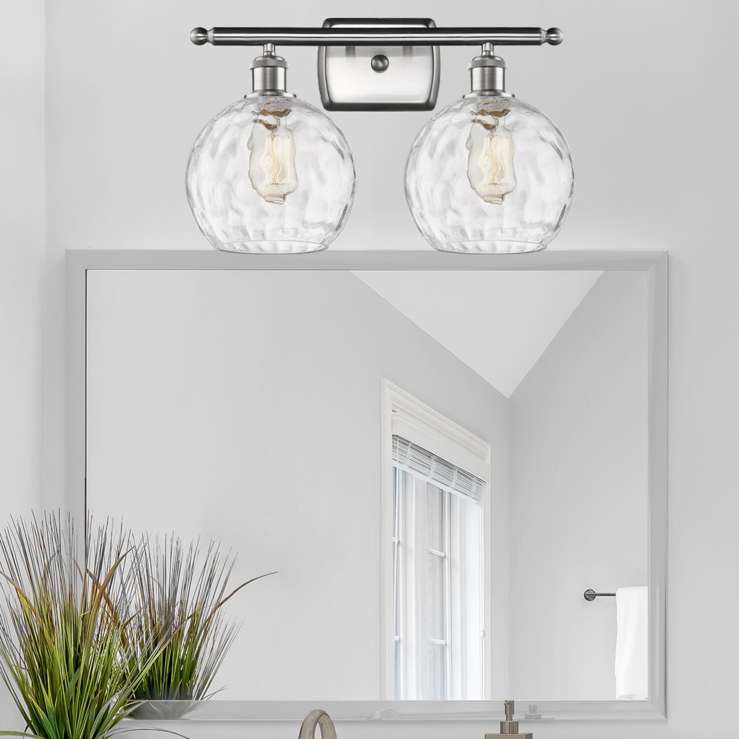 Shown in Brushed Satin Nickel finish and Clear glass