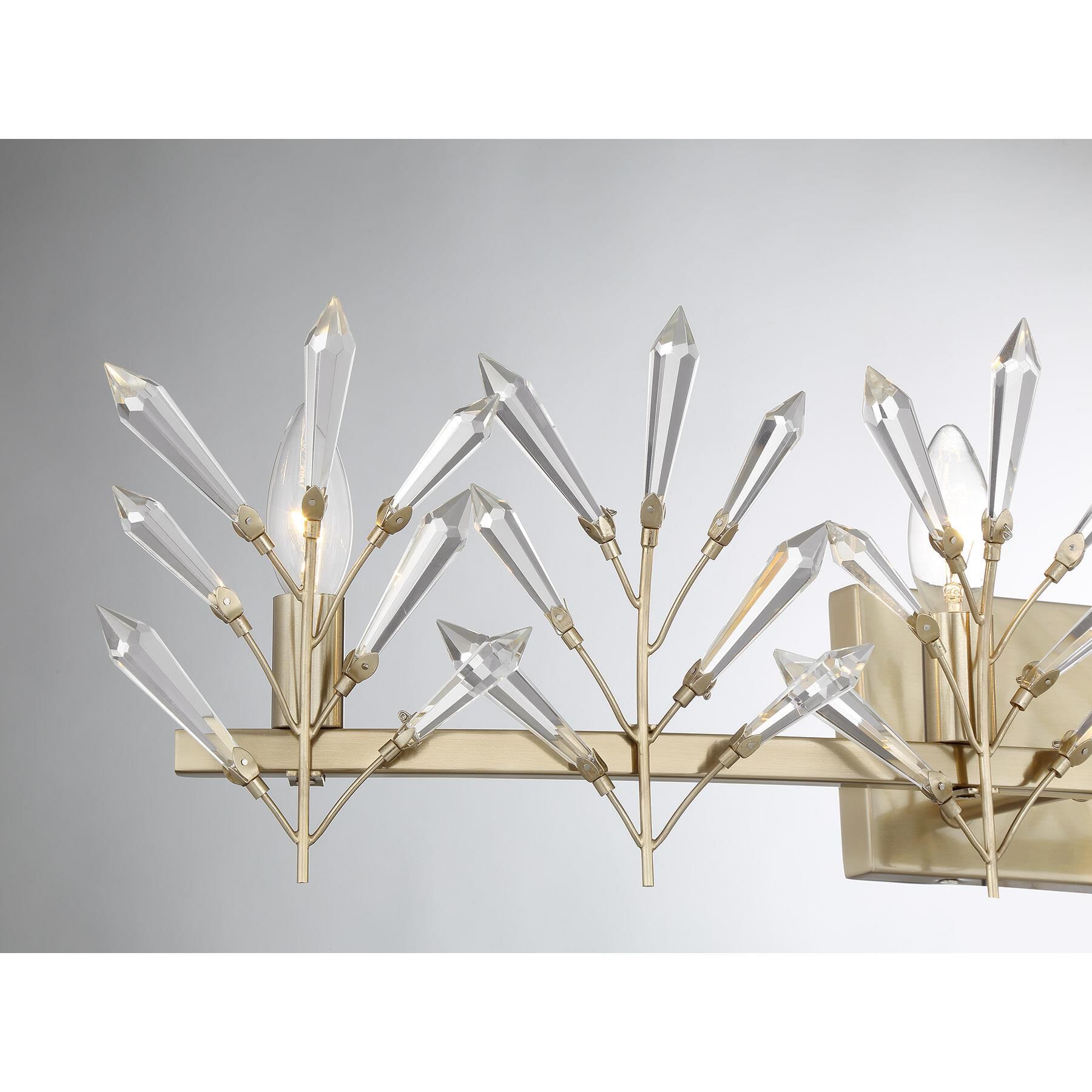 Shown in Noble Brass finish and Clear crystal