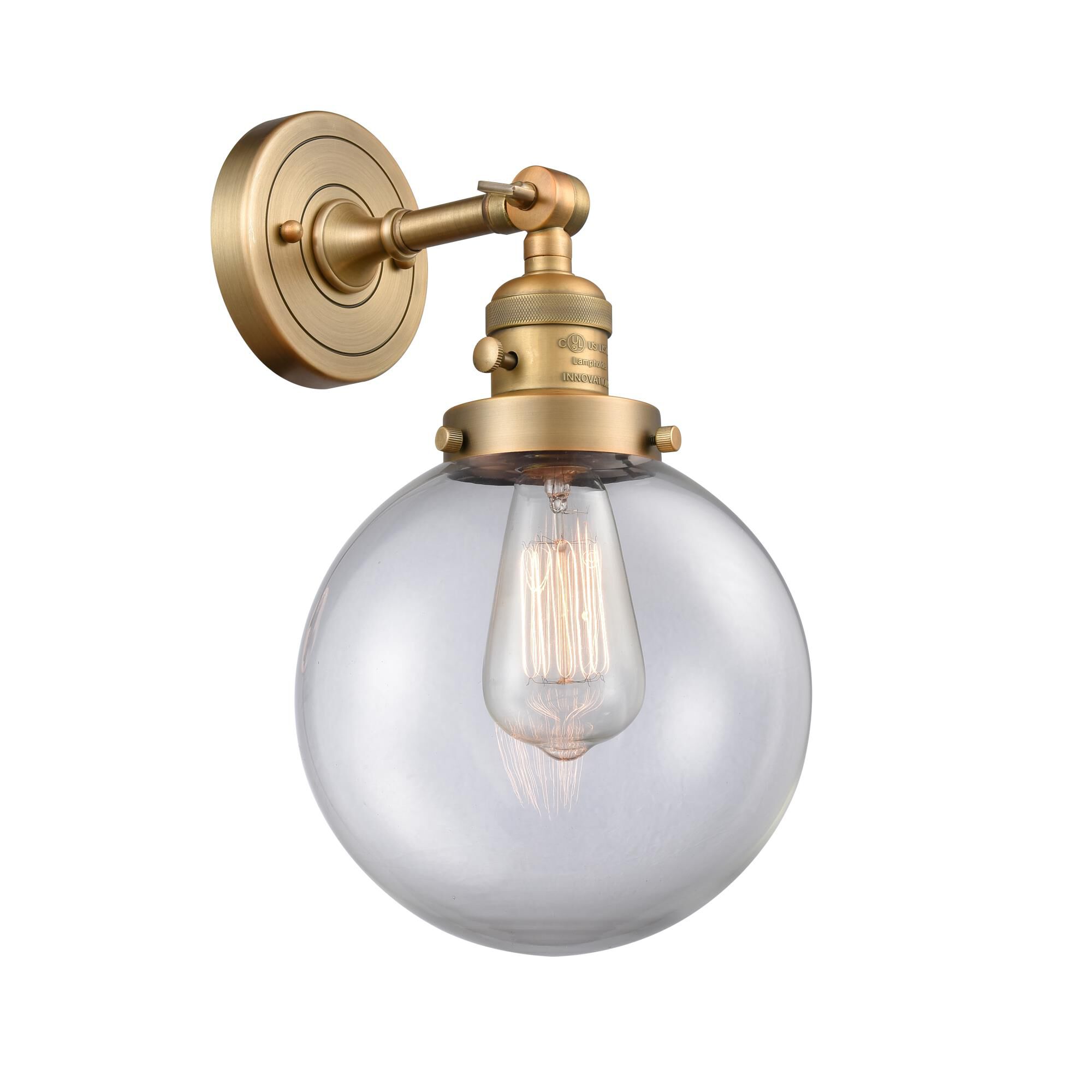 Shown in Brushed Brass finish and Clear glass