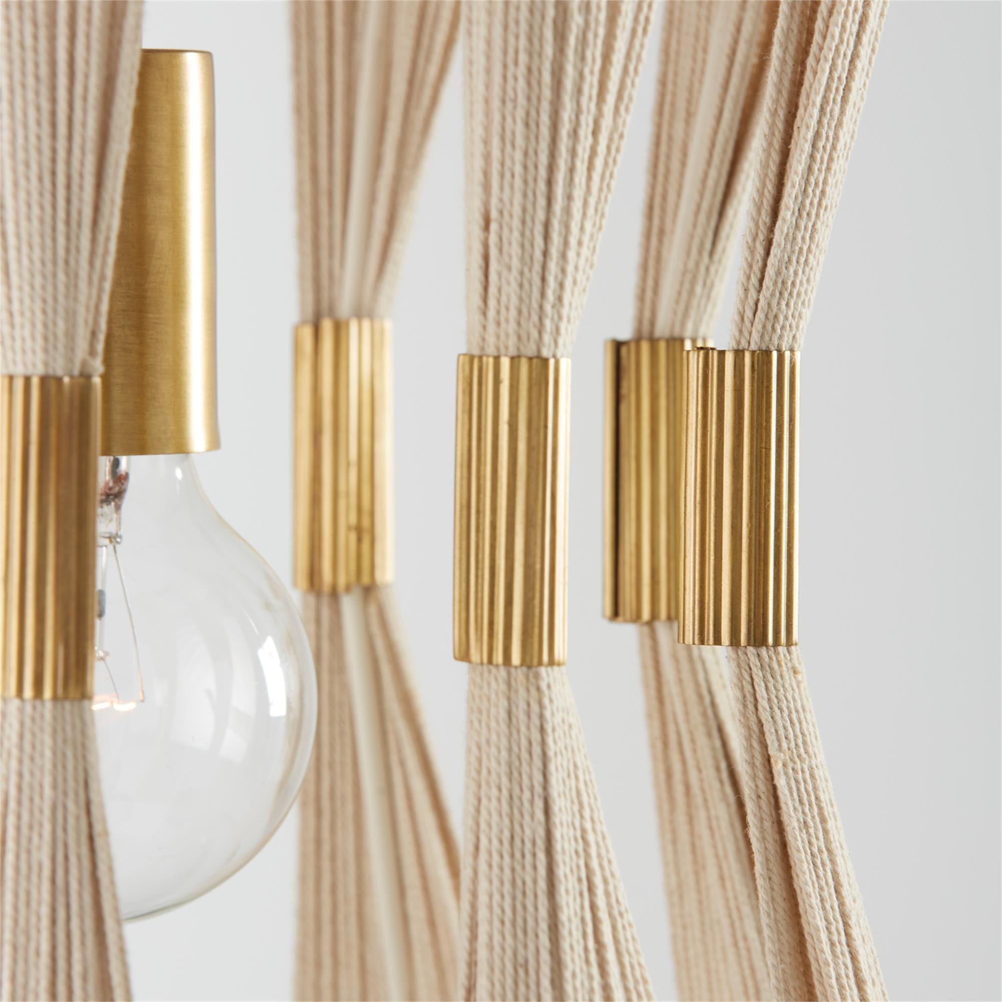 Shown in Bleached Natural Rope And Painted Brass finish