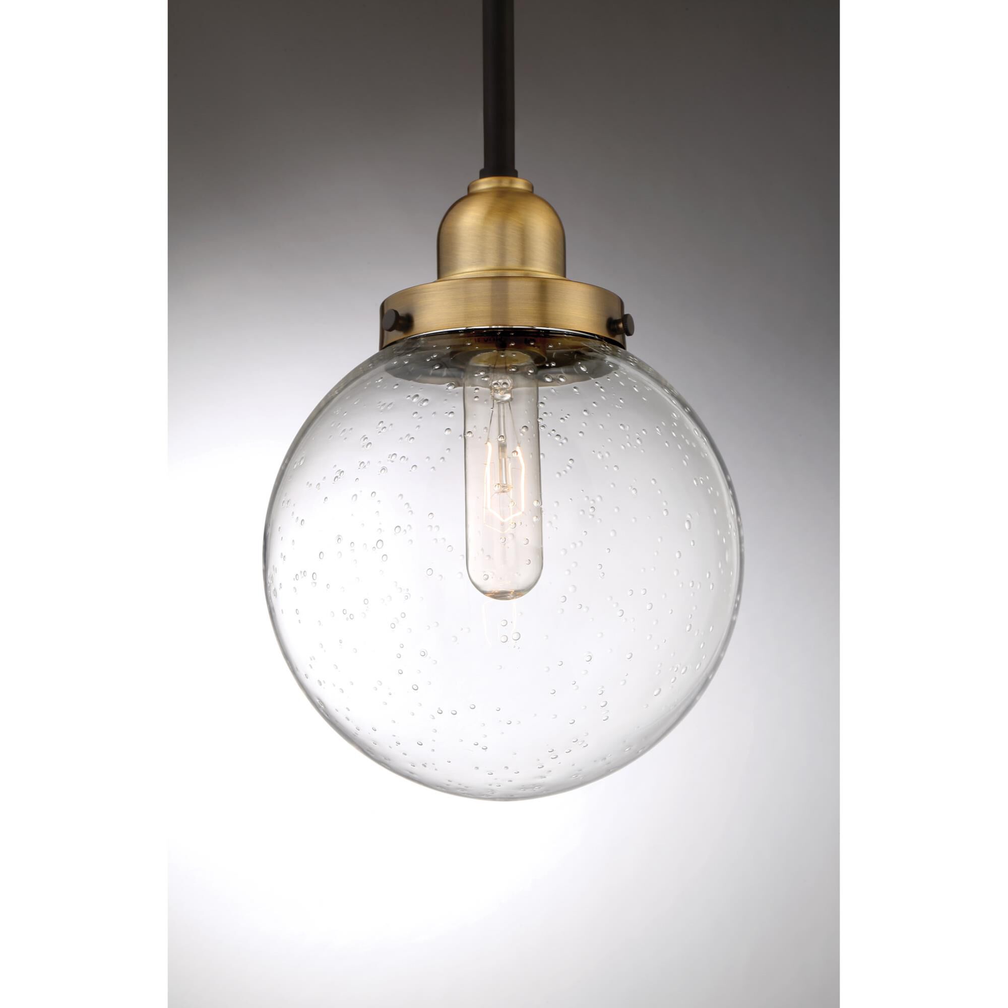 Shown in Western Bronze finish and Clear Seedy glass 