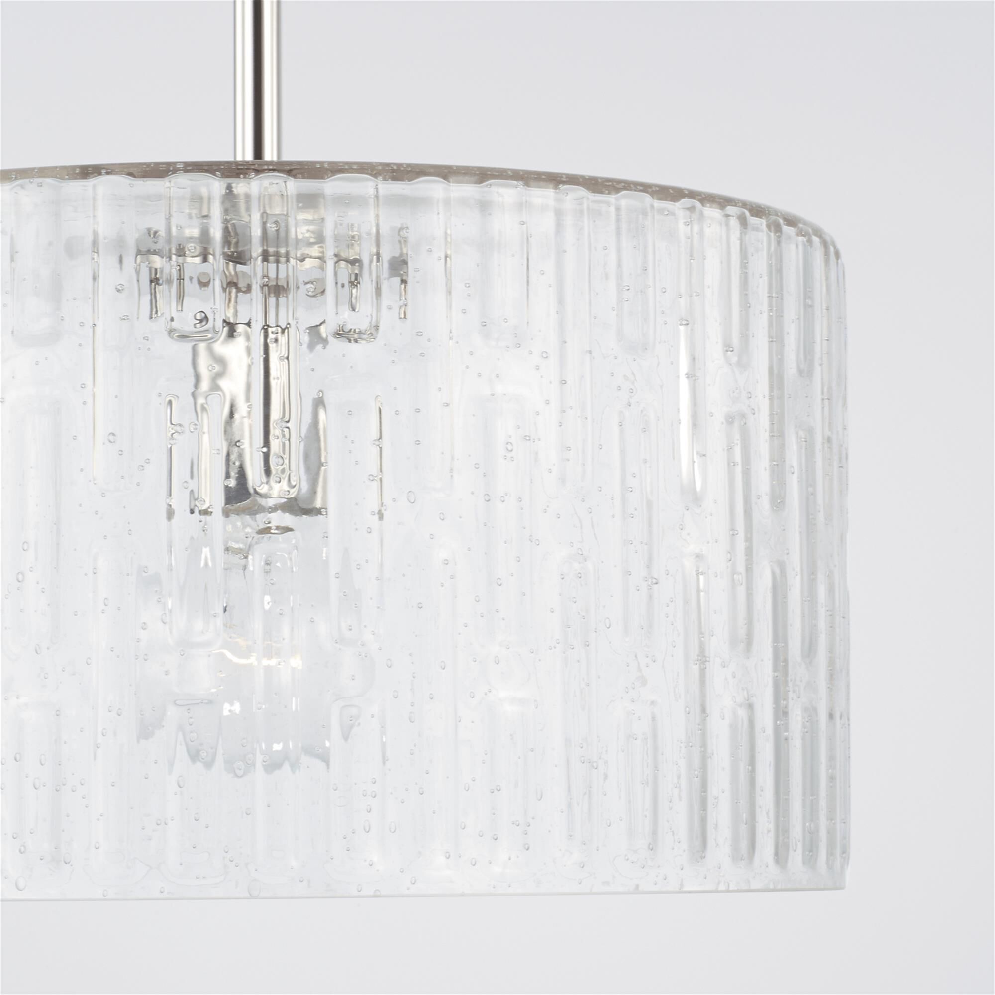 Shown in Polished Nickel finish and Embossed Seeded glass