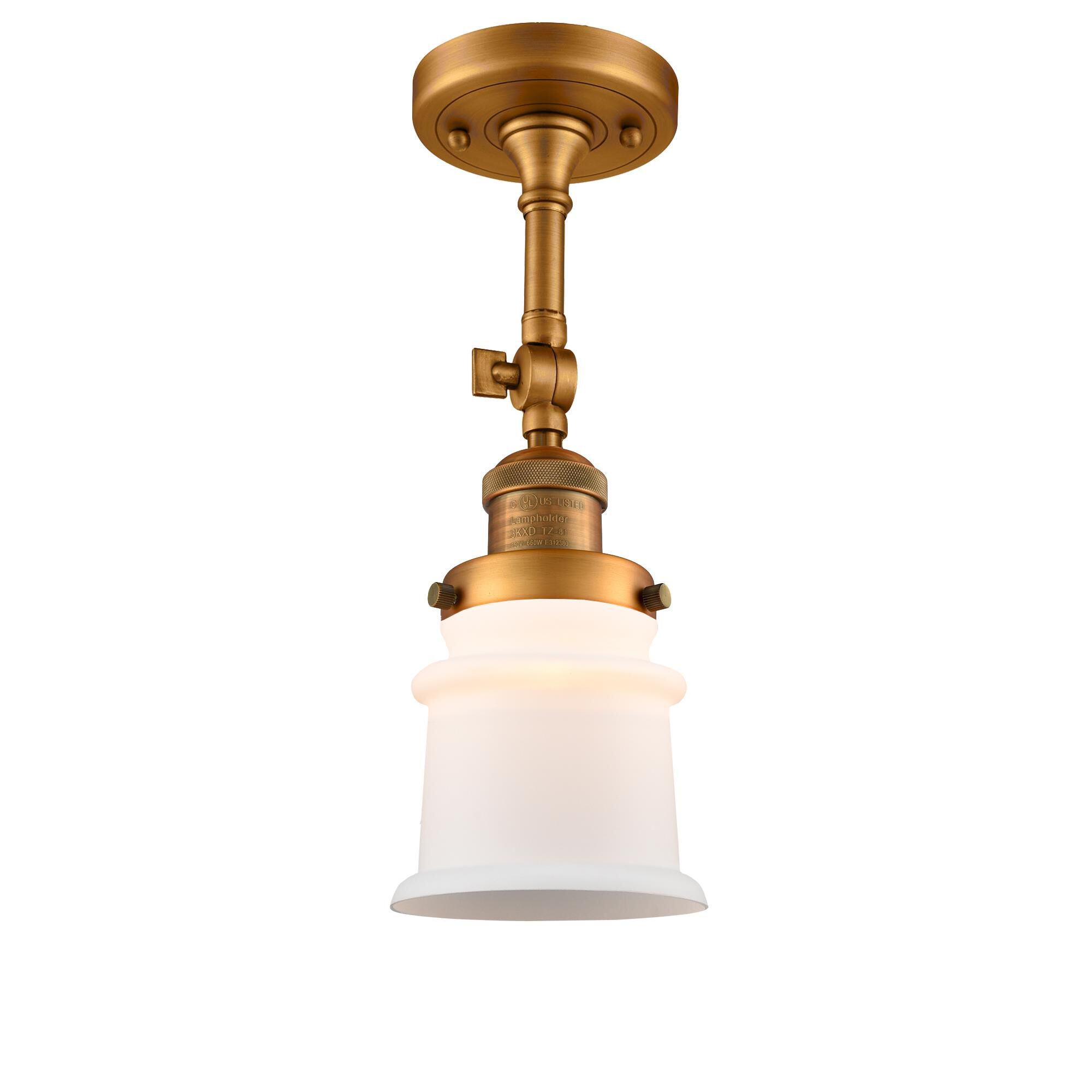 Shown in Brushed Brass finish and Frosted glass and None accent