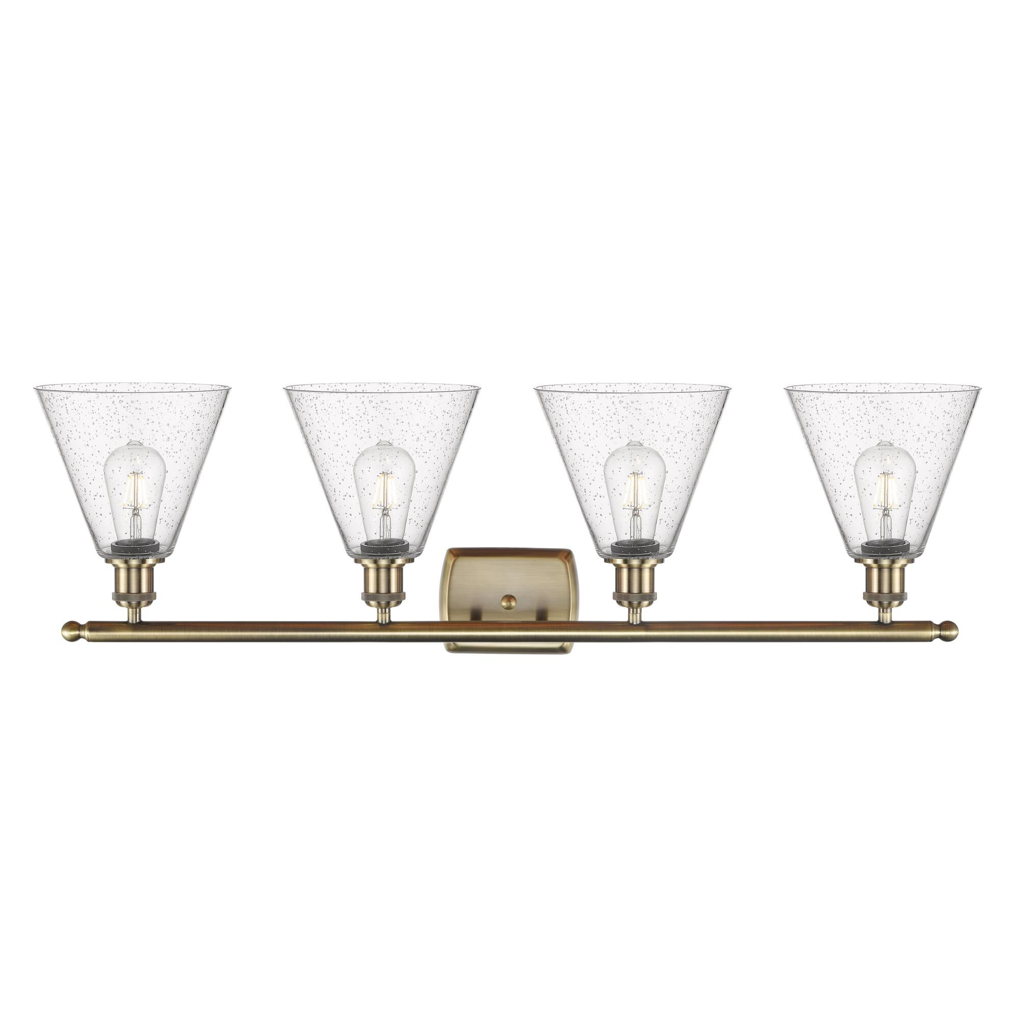 Shown in Antique Brass finish and Seedy Ballston Cone glass and No Shade shade