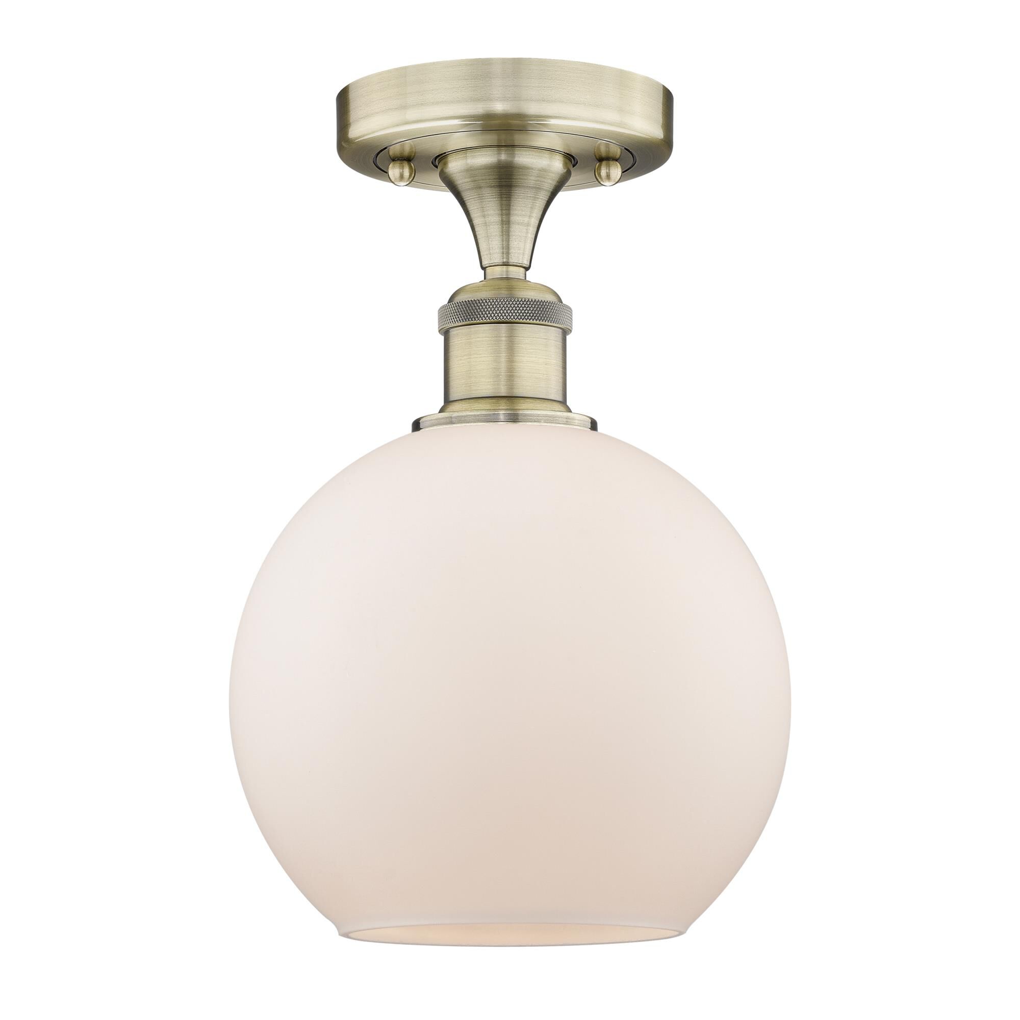 Shown in Antique Brass finish and Matte White glass