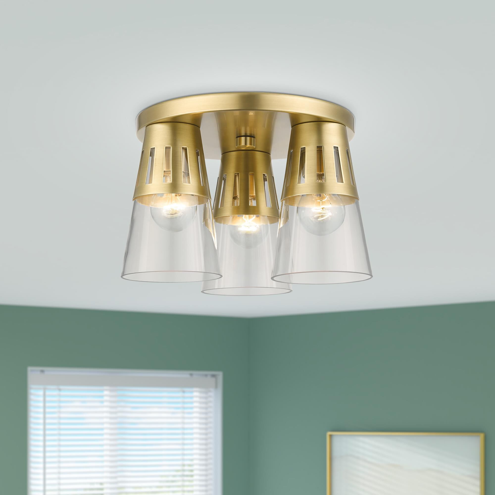 Shown in Natural Brass finish and Clear Hand Blown glass