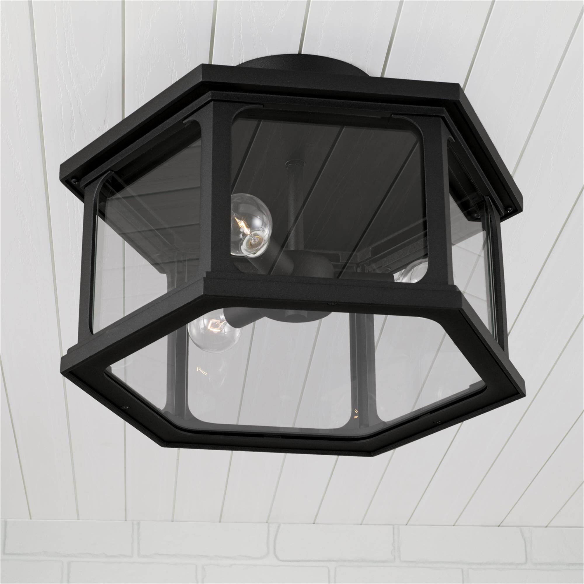 Shown in Black finish and Clear glass