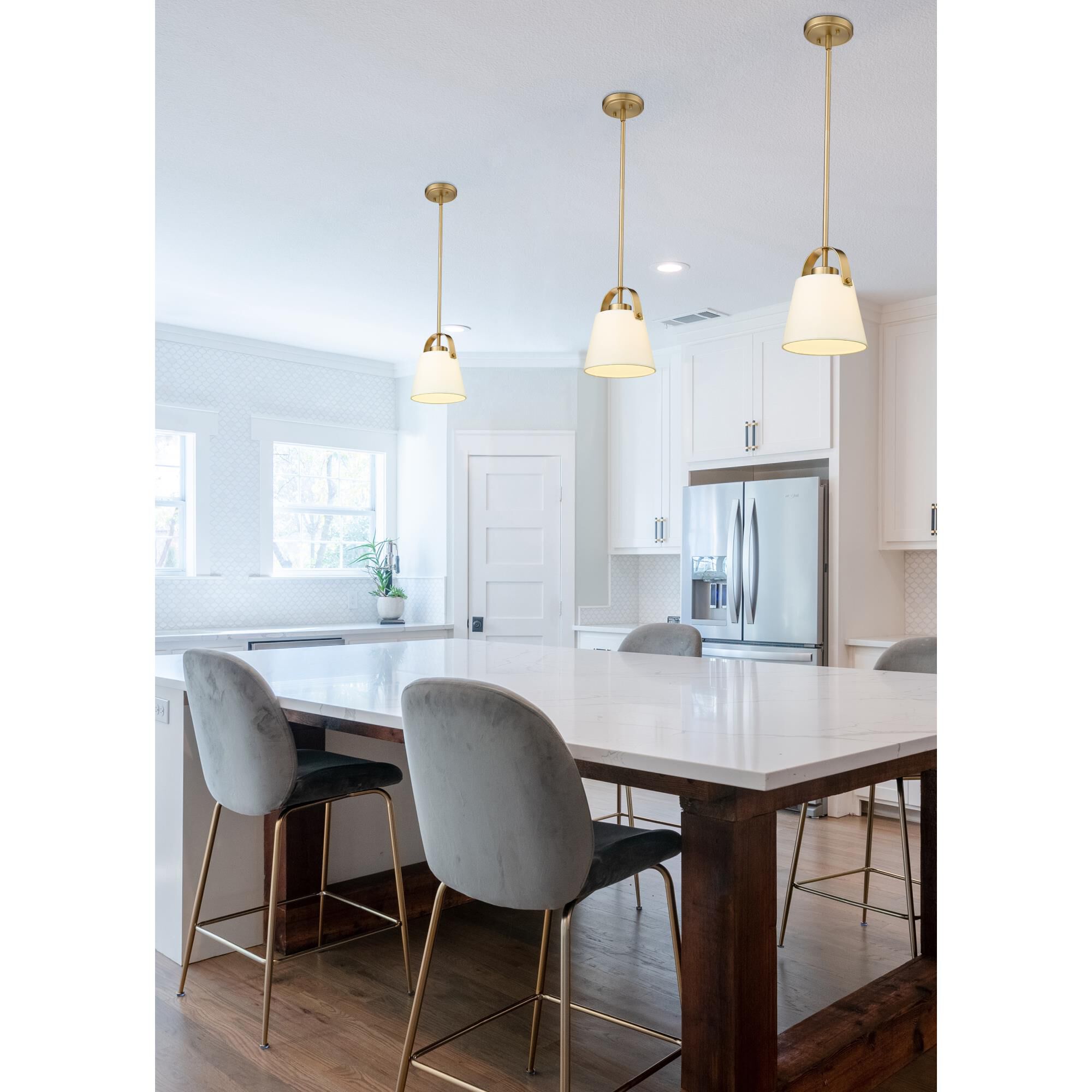 Shown in Heritage Brass finish and Ivory glass