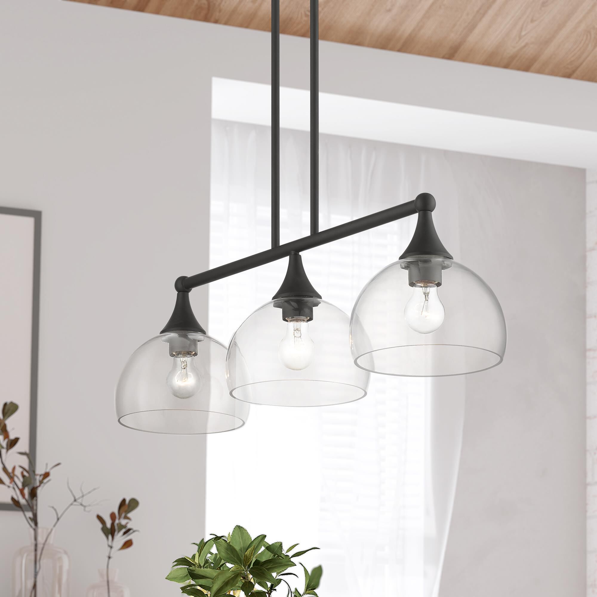 Shown in Bronze finish and Clear Hand Blown glass