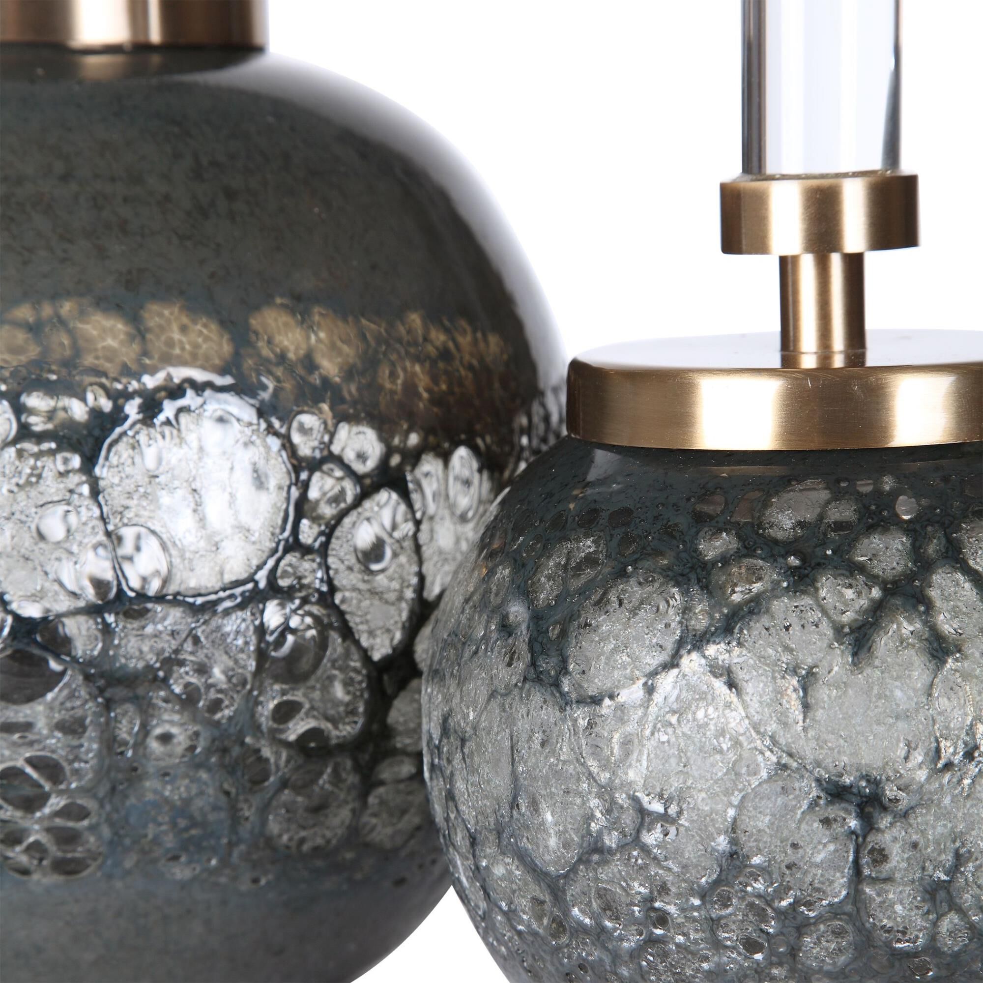 Shown in Set Of Two Art Glass Bottles Feature Organic Texture With An Iridescent Blue-Gray Hue. Each Bottle I finish