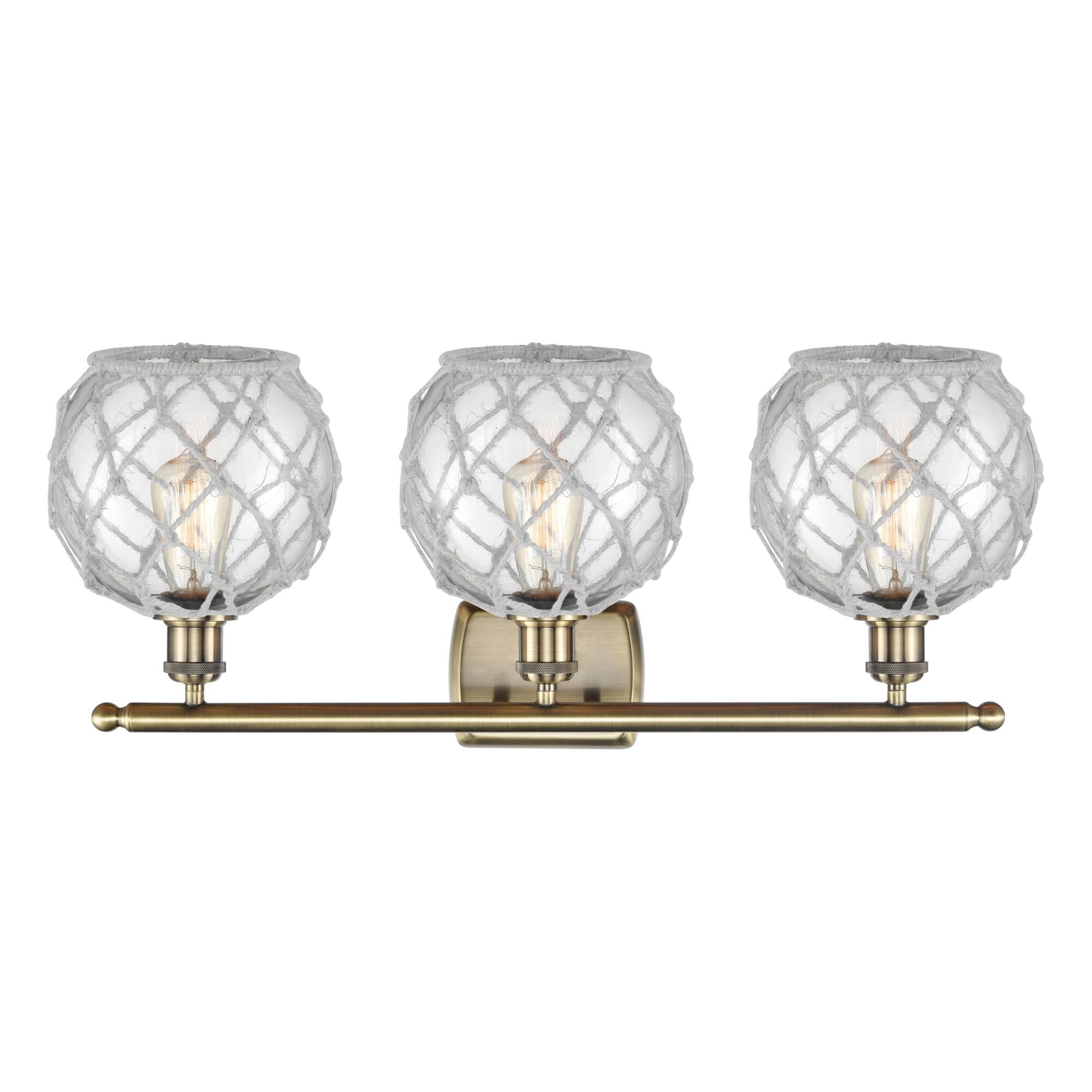 Shown in Antique Brass finish and Clear with White Rope glass