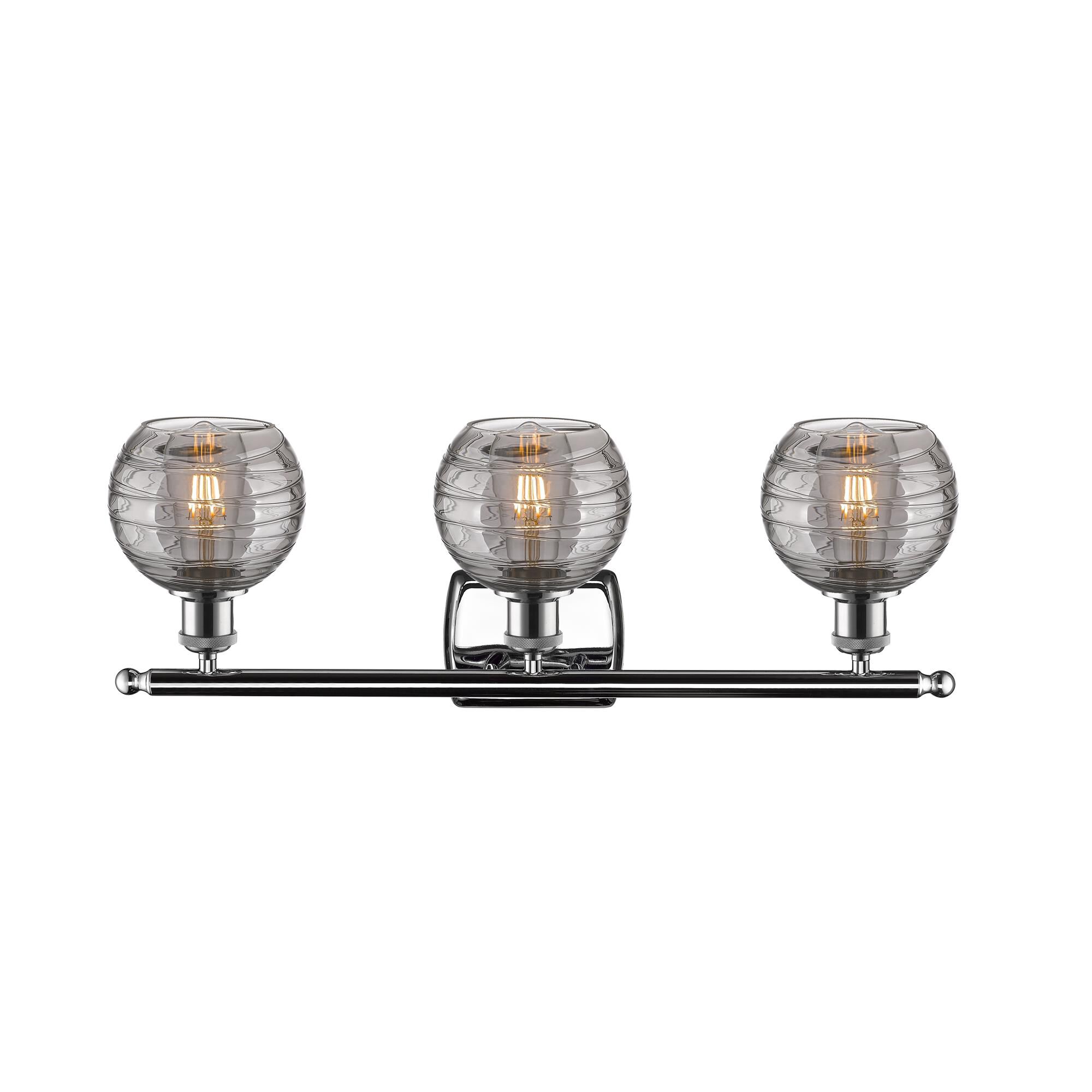 Shown in Polished Chrome finish and Light Smoke Deco Swirl glass