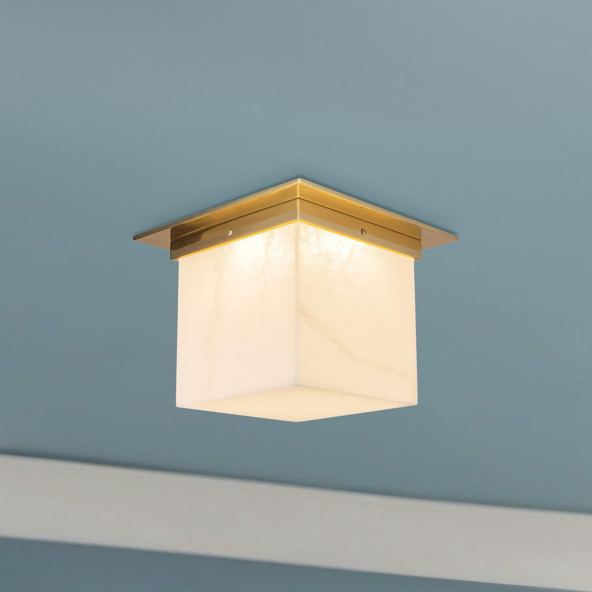 Shown in Patina Brass finish and Alabaster glass